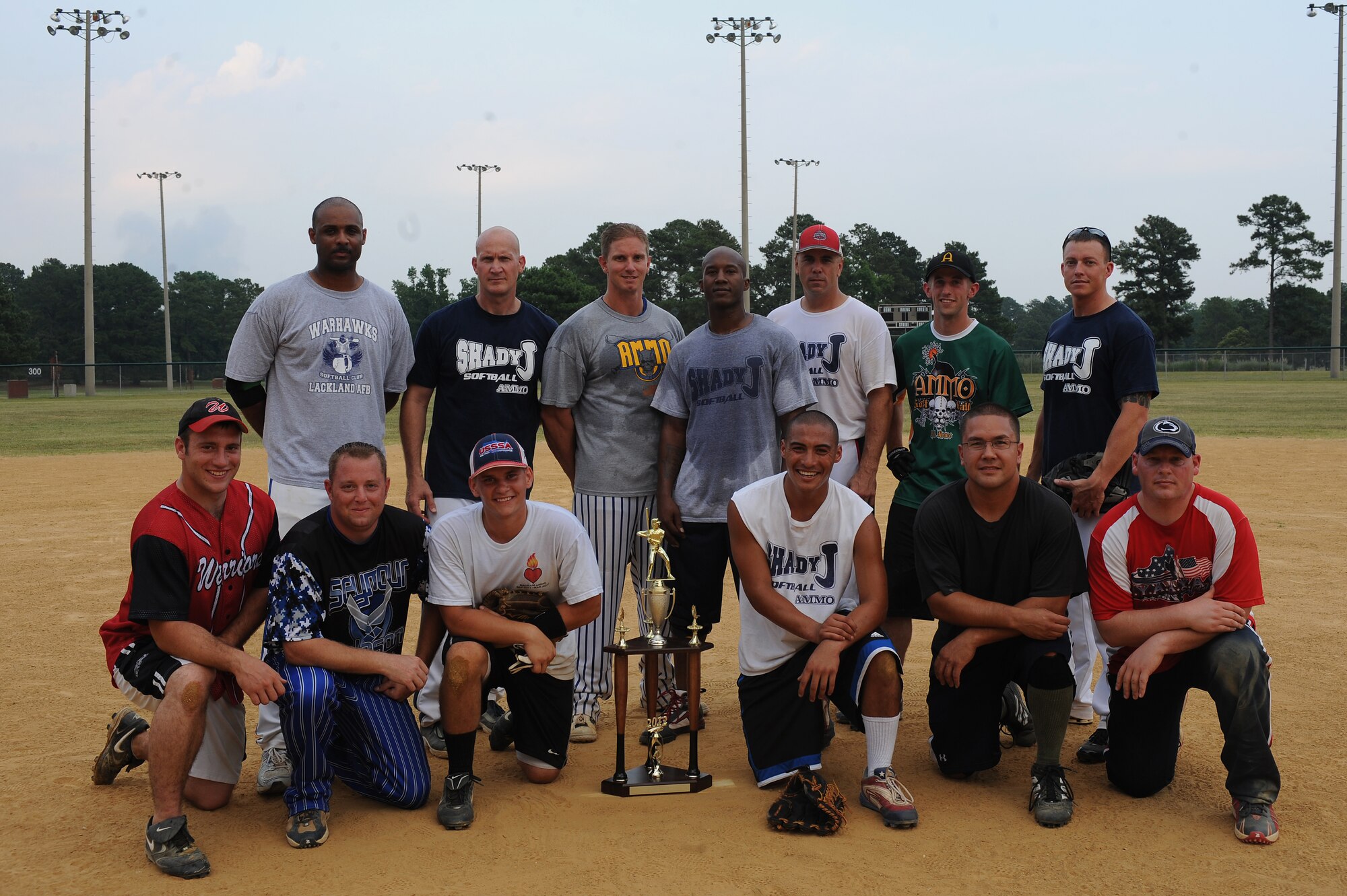 Airmen from the 4th Equipment Maintenance Squadron Ammo team pose for a group photo after winning the base intramural softball championship game on Seymour Johnson Air Force Base, N.C., June 21, 2012. Ammo faced the 4th EMS Aircrew Ground Equipment team, winning the game 13 to 4. (U.S. Air Force photo/Airman 1st Class John Nieves Camacho/Released)