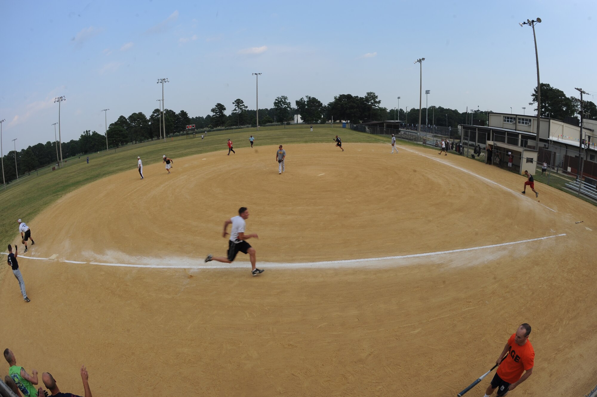Players of the 4th Equipment Maintenance Squadron Aircrew Ground Equipment team run the bases during the base intramural softball championship game on Seymour Johnson Air Force Base, N.C., June 21, 2012. The championship game was held by the 4th Force Support Squadron and took place at the fitness center’s field. (U.S. Air Force photo/Airman 1st Class John Nieves Camacho/Released)