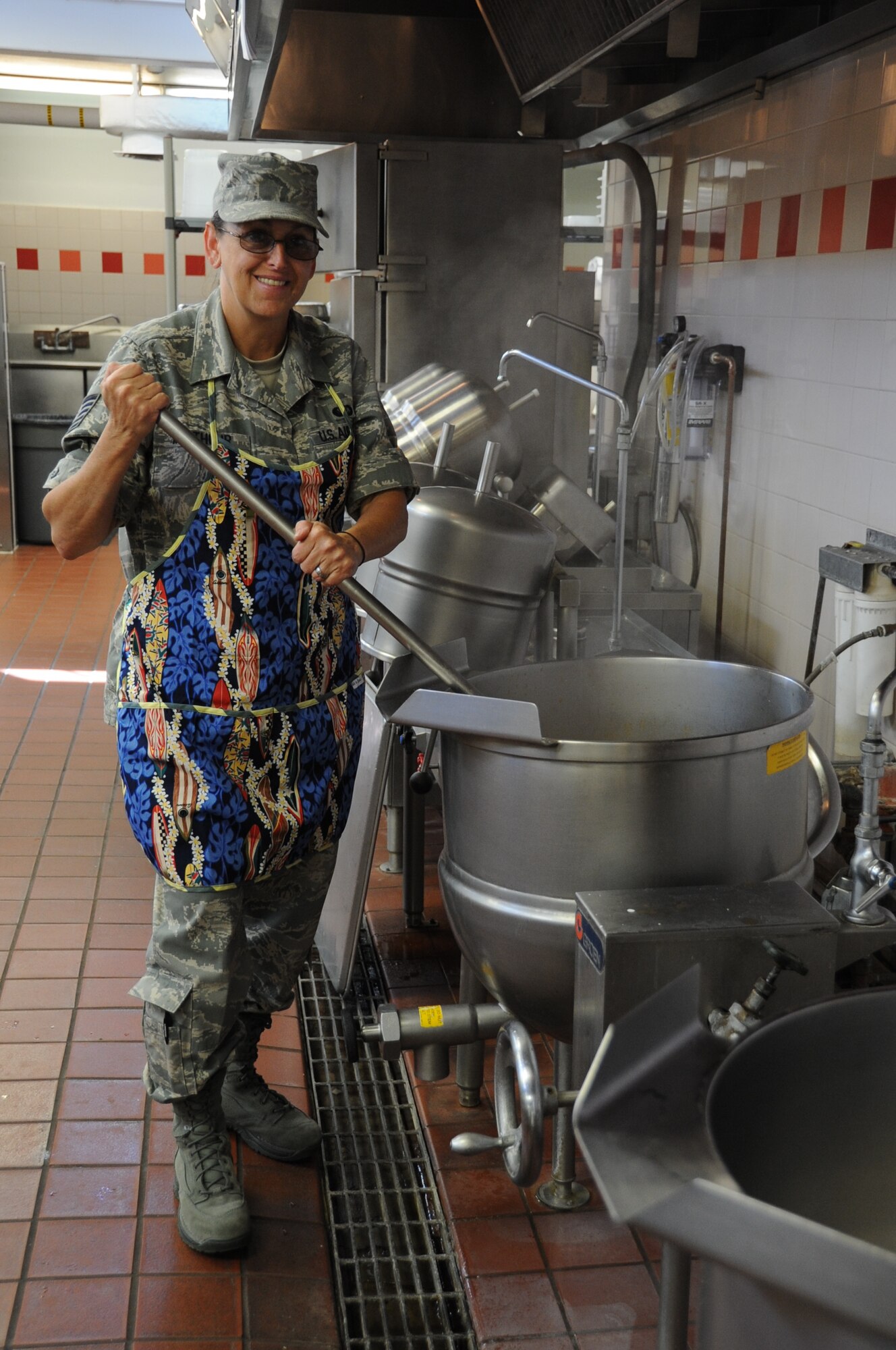 JOINT BASE PEARL HARBOR-HICKAM, Hawaii – Tech. Sgt. Susan Walthour, 442nd Force Support Squadron, stirs a pot of stew at the dining facility here, June 22. Walthour is on temporary duty working and training in various positions on base and during this duty she was returning to her birth place. The 442nd Force Support Squadron is part of the 442nd Fighter Wing, an A-10 Thunderbolt II Reserve unit at Whiteman Air Force Base, Mo. (U.S. Air Force photo/Staff Sgt. Lauren Padden)