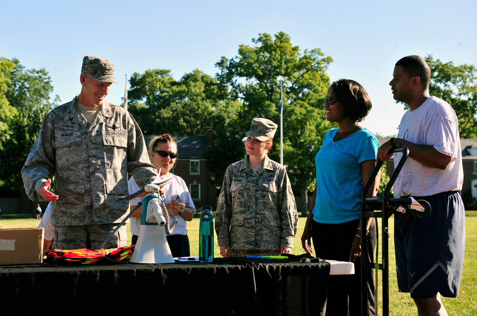 Colonel David Almand, 375th Air Mobility Wing commander, thanks the members who helped put together the Sexual Assault Response Coordinator sponsored 5k June 22, at Scott Air Force Base, Ill. The run was organized by Team Scott SARC Victim Advocates.  (U.S. Air Force photo/ Staff Sgt. Stephenie Wade)