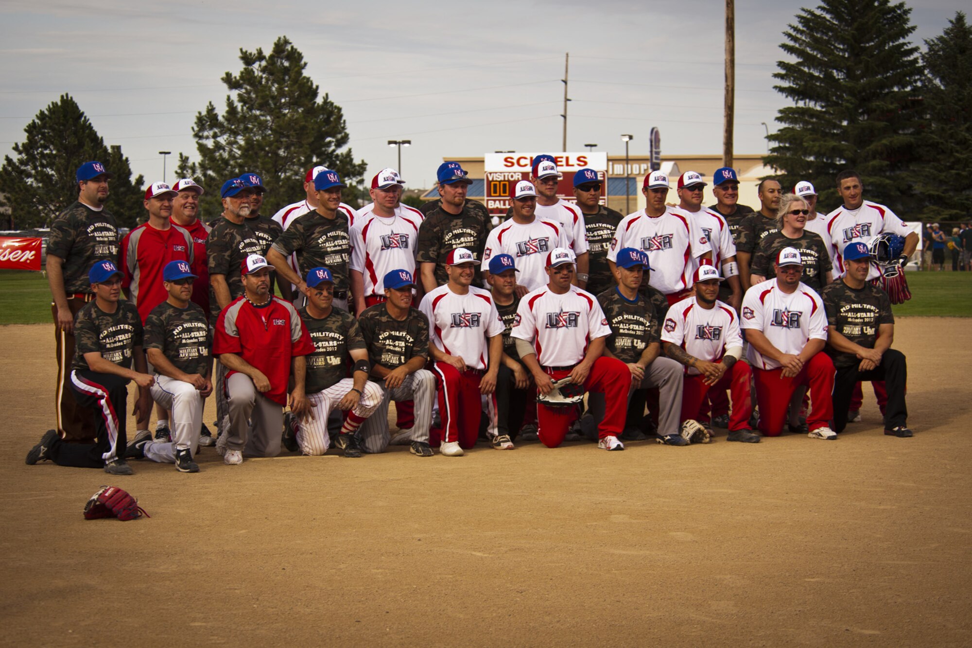 Bismarck, N.D. -- The first ever McQuade's North Dakota Military All Stars Softball Team played Team USA Features on June 22 in the first exhibition game of the Sam McQuade Softball Tournament. Staff Sgt. Louis Kane, 705th Munitions Squadron, represents Team Minot. The Sam McQuade Sr./Budweiser Charity Softball Tournament is the US' largest non-profit, one weekend slowpitch softball tournament that brings together players, families and fans from all over the country. (Courtesy photo)