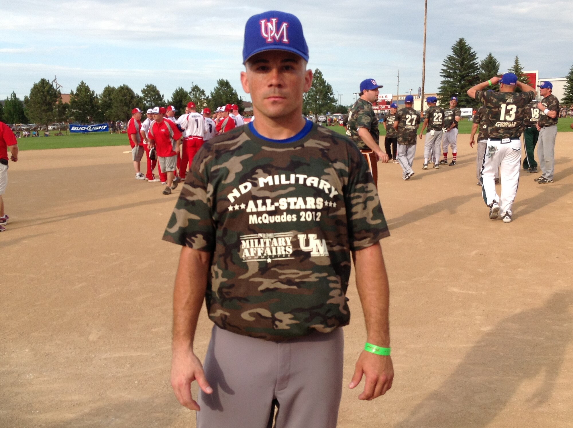 Bismarck, N.D. -- The first ever McQuade's North Dakota Military All Stars Softball Team played Team USA Features on June 22 in the first exhibition game of the Sam McQuade Softball Tournament. Staff Sgt. Louis Kane, 705th Munitions Squadron, represents Team Minot. The Sam McQuade Sr./Budweiser Charity Softball Tournament is the US' largest non-profit, one weekend slowpitch softball tournament that brings together players, families and fans from all over the country. (Courtesy photo)