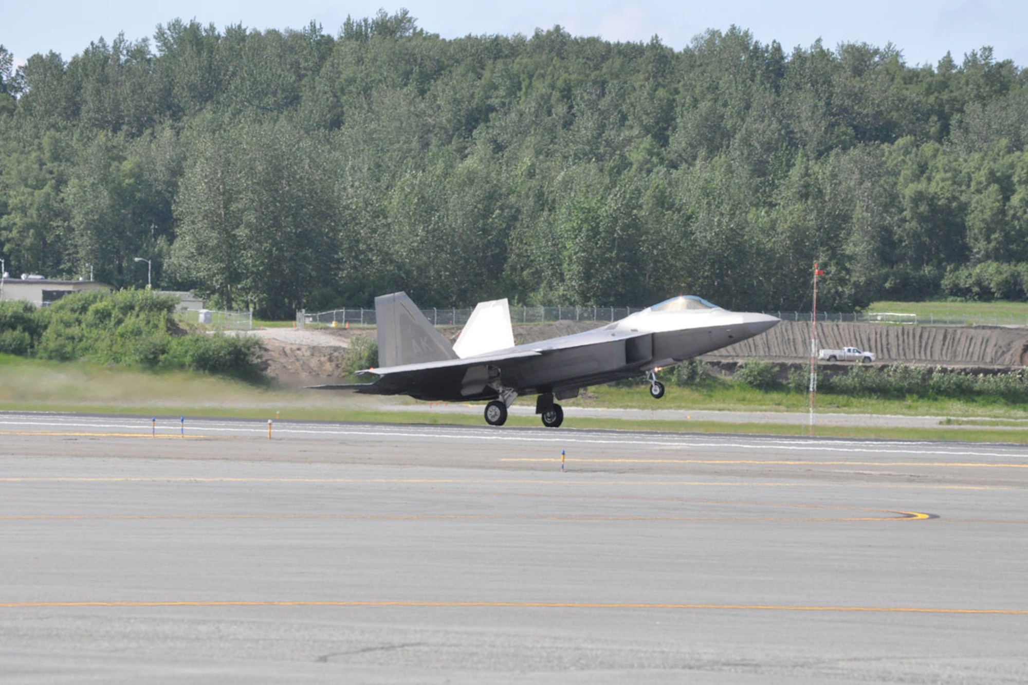 JOINT BASE ELMENDORF-RICHARDSON, Alaska --- 525th Fighter
Squadron "Bulldogs" prepare to land F-22s at JBER June 20, 2012 after flying
sorties in Red Flag-Alaska. Red Flag-Alaska 12-2, June 6-22, was the first
multi-national RF-A in which F-22s cleared the skies of simulated enemies
for partner nations. (U.S. Air Force photo/Luke Waack)
