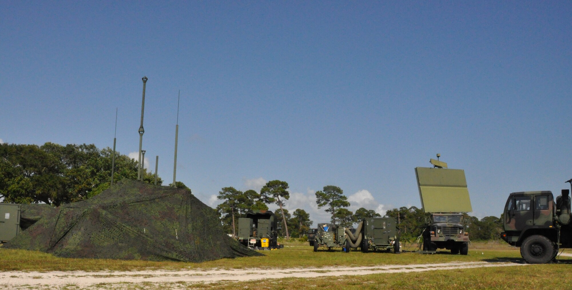 Members of the 728th Air Control Squadron, nicknamed “Demons,” from Eglin Air Force Base, Fla., set up a radar site at Tyndall’s Heritage Park May 29 through June 2 to support the 325th ACS change of command and allow Air Battle Manager students to see what they can expect from their future assignments. (U.S. Air Force photo by Airman 1st Class Christopher Reel)