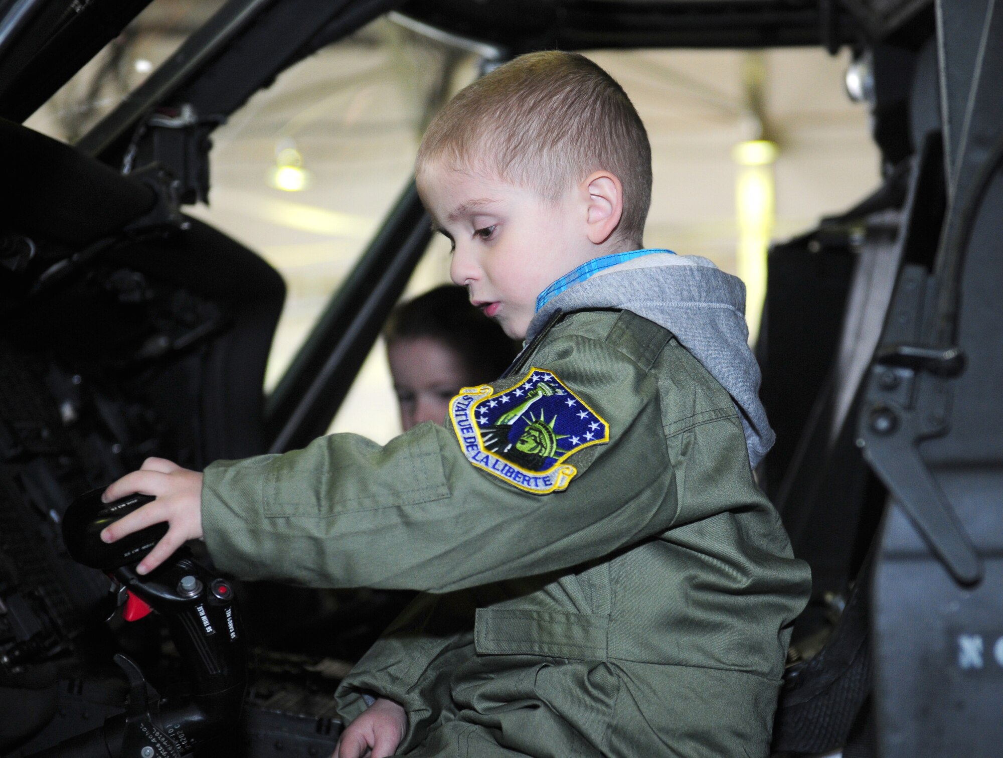 ROYAL AIR FORCE LAKENHEATH, England – Callum Carr, 4-year-old, takes a seat in an HH-60G Pave Hawk during a Pilot for A Day tour June 22, 2012. Carr was diagnosed with Ewings carcinoma and has been undergoing treatment for several months. The Pilot for a Day program is new to RAF Lakenheath and provides children in the local community who are fighting life-threatening illnesses or conditions a day of learning and fun as a break from doctor visits. (U.S. Air Force photo by Airman 1st Class Cory D. Payne)
