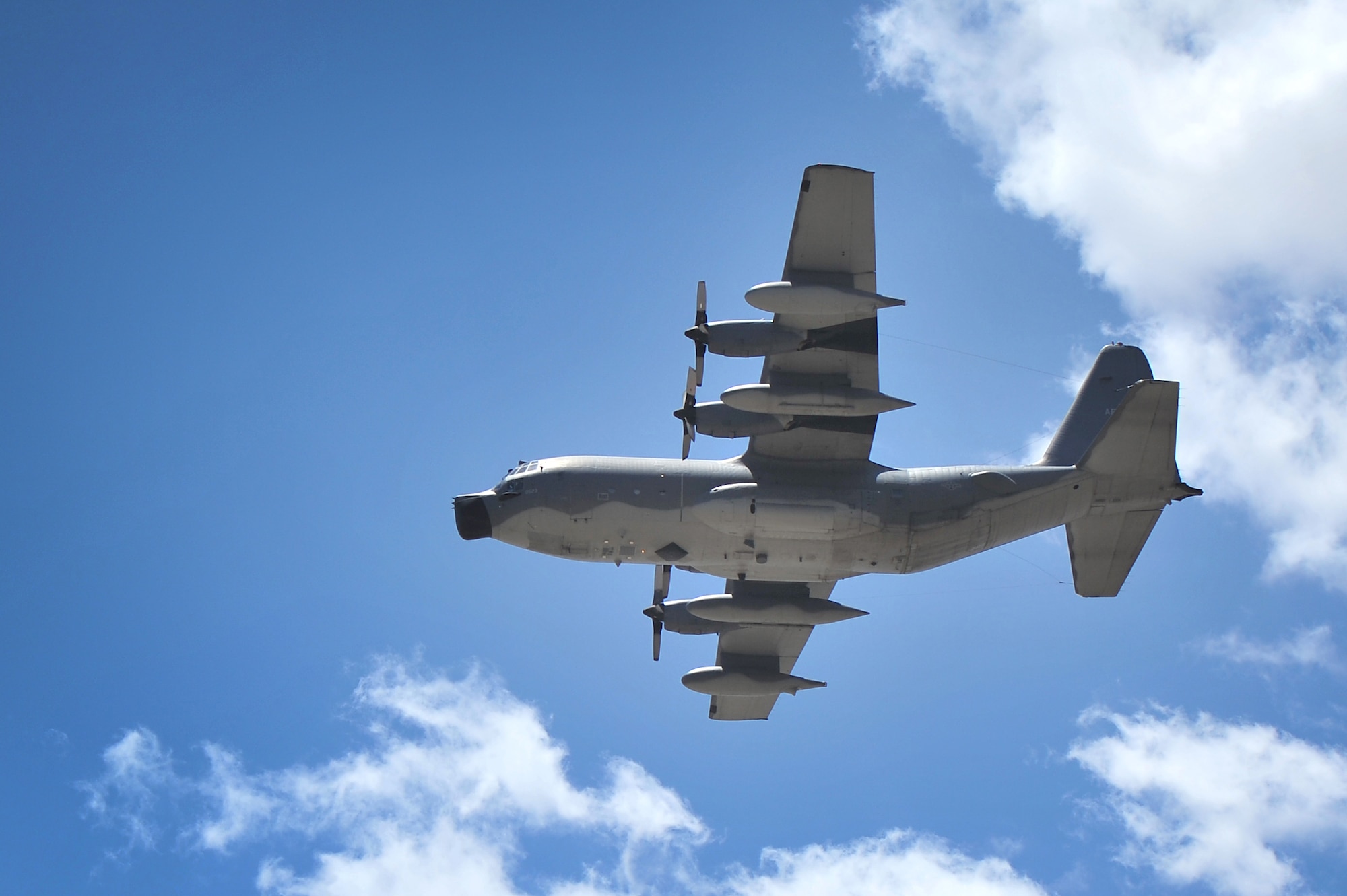 An MC-130E Combat Talon I flies over the flightline during an aircraft retirement ceremony at Cannon Air Force Base, N.M., June 22, 2012. This particular Talon I was the lead aircraft that performed a Prisoner of War extraction in North Vietnam called the Son Tay Raid in 1970. (U.S. Air Force photo by Airman 1st Class Alexxis Pons Abascal)  