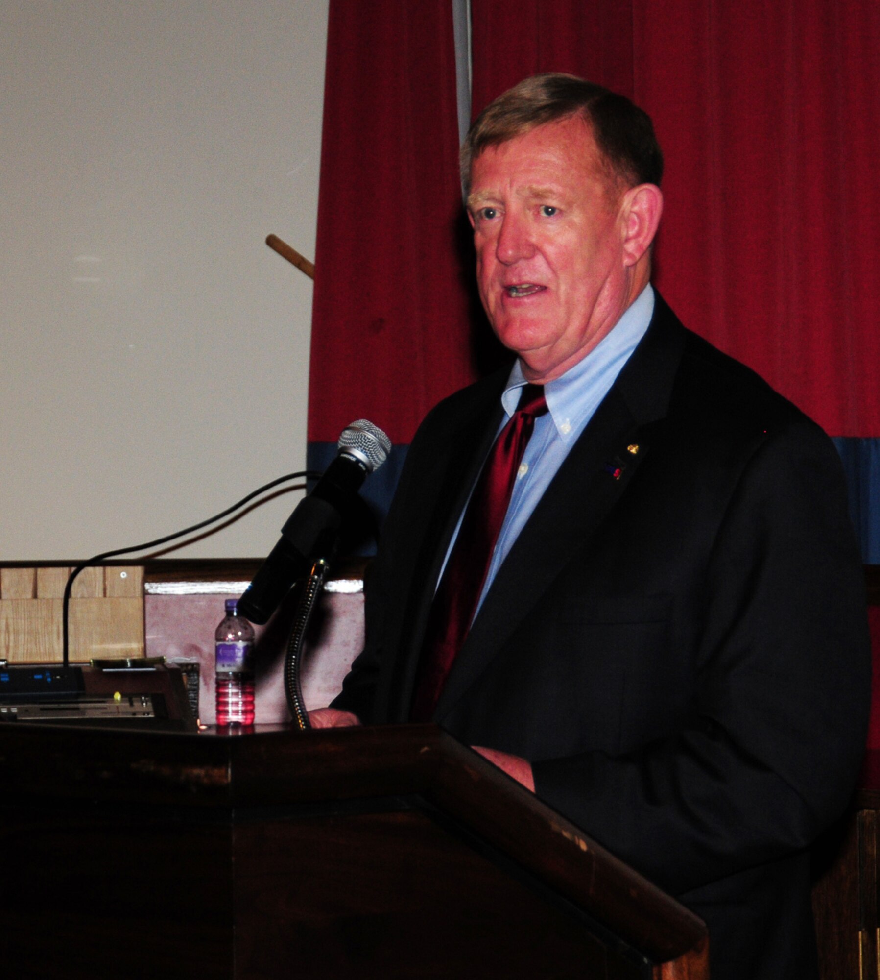 RAF MILDENHALL -- Retired U.S. Army Marine Corps Lt. Gen. Jack Klimp speaks to retirees in the Galaxy Club, RAF Mildenhall, at the Retiree Appreciation Day June 22, 2012. This year's event was combined with RAF Lakenheath, and is the 26th Annual RAD. More than 170 people attended and had the chance to see a static KC-135 Stratotanker, military working dog demonstration, and other units from around the base including the 100th Civil Engineer Squadron Fire Department and Emergency Management. (U.S. Air Force photo/Karen Abeyasekere)