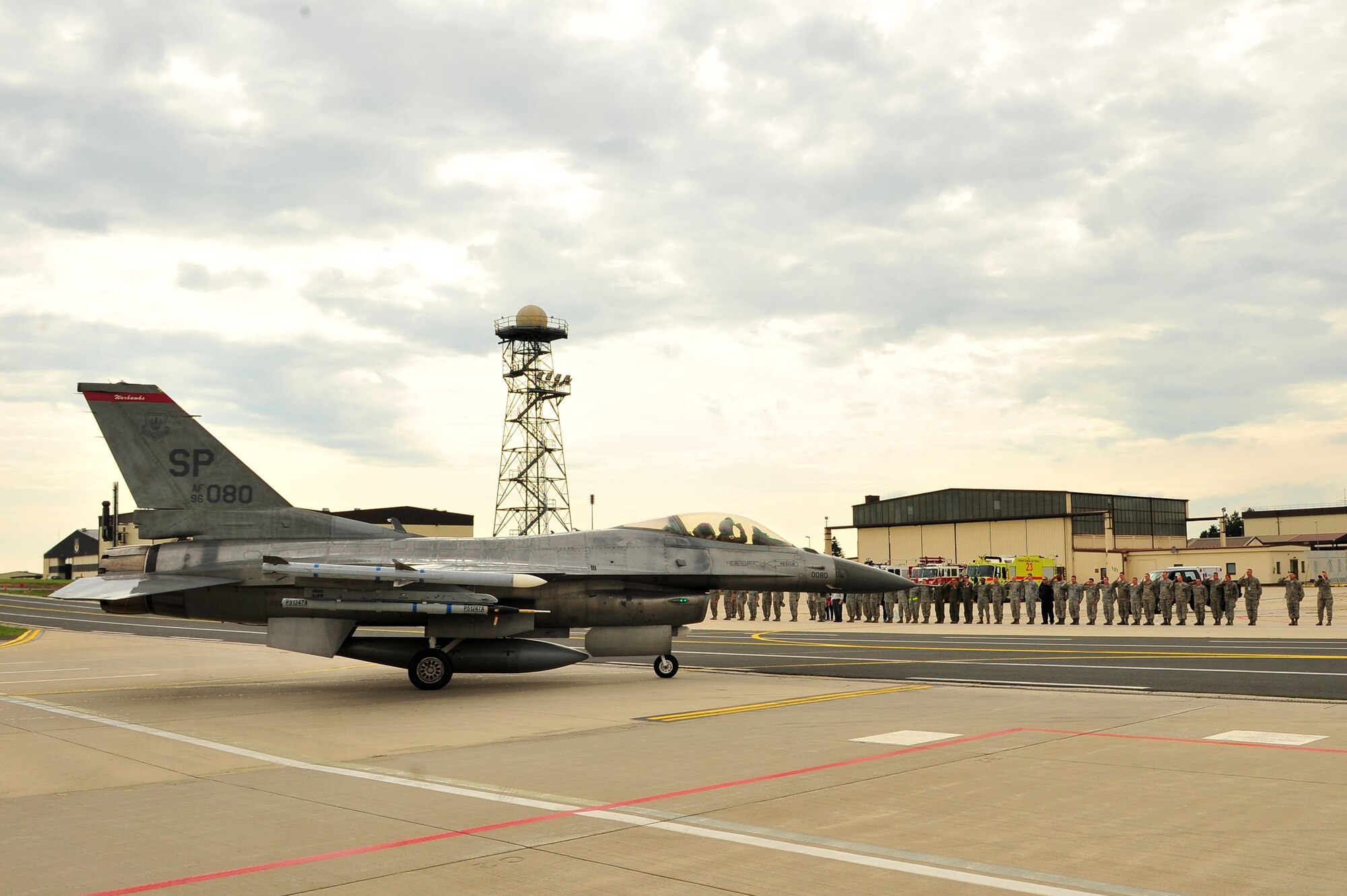 SPANGDAHLEM AIR BASE, Germany – Brig. Gen. Chris Weggeman, 52nd Fighter Wing commander, taxis an F-16 Fighting Falcon past saluting members of the 52nd FW after landing his final F-16 here June 21. Weggeman commanded the 52nd FW for two years. (U.S. Air Force photo by Airman 1st Class Dillon Davis/Released)