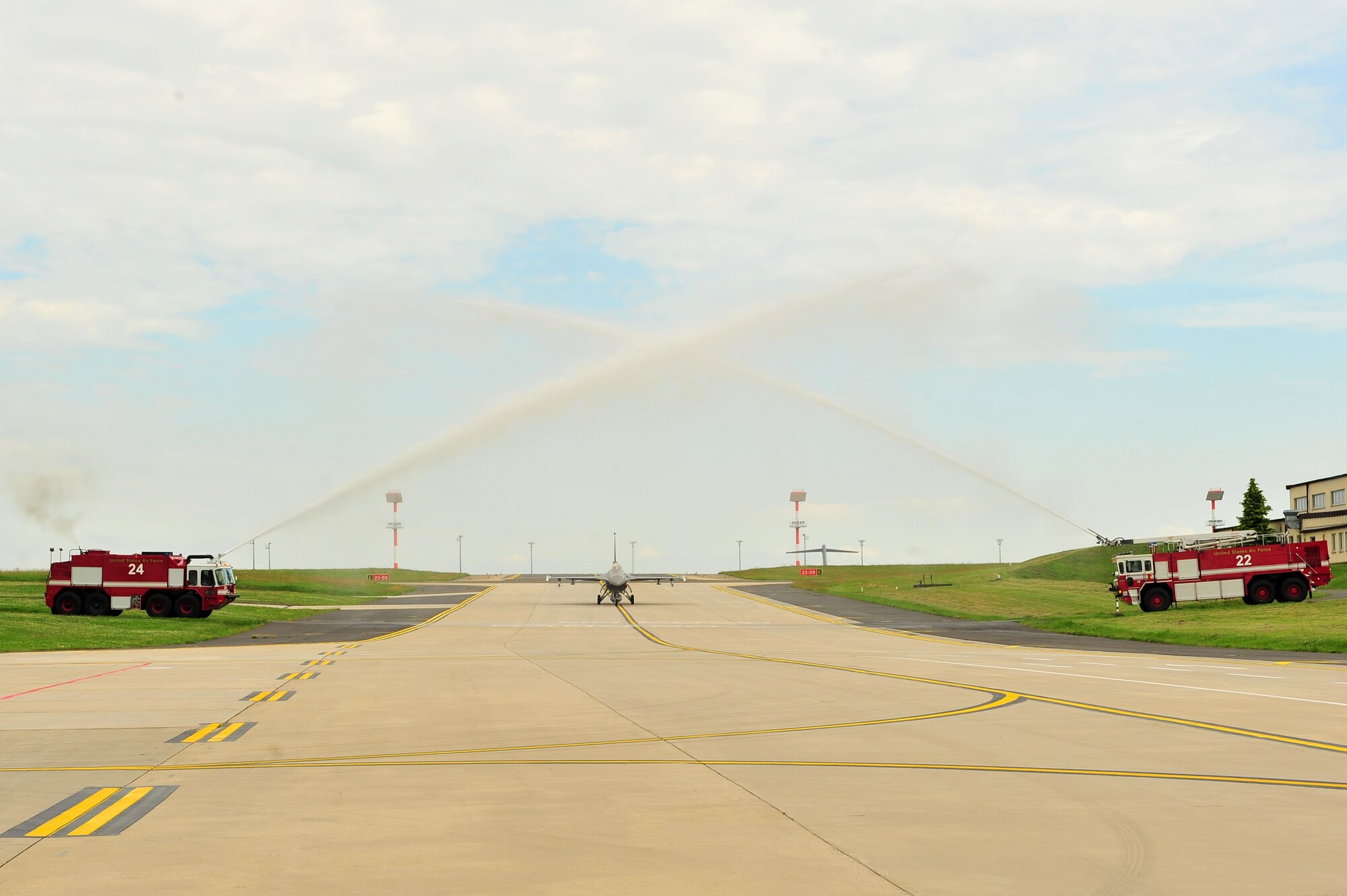 SPANGDAHLEM AIR BASE, Germany – Brig. Gen. Chris Weggeman, 52nd Fighter Wing commander, taxis an F-16 Fighting Falcon beneath two streams of water after landing his final flight here June 21. Weggeman commanded the 52nd FW for two years. (U.S. Air Force photo by Airman 1st Class Dillon Davis/Released)