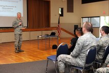 U.S. Air Force Col. Van Wimmer, 35th Fighter Wing vice commander, answers questions at a simulated town hall meeting during an emergency management exercise at Misawa Air Base, Japan, June 25, 2012. For this EME, Misawa Airmen responded to a simulated 9.2 magnitude earthquake 15 miles off the coast of Japan.  The purpose of the exercise was to test the base’s disaster preparedness and help maintain readiness in case of a real world natural disaster. (U.S. Air Force photo by Airman 1st Class Kia Atkins/Released)