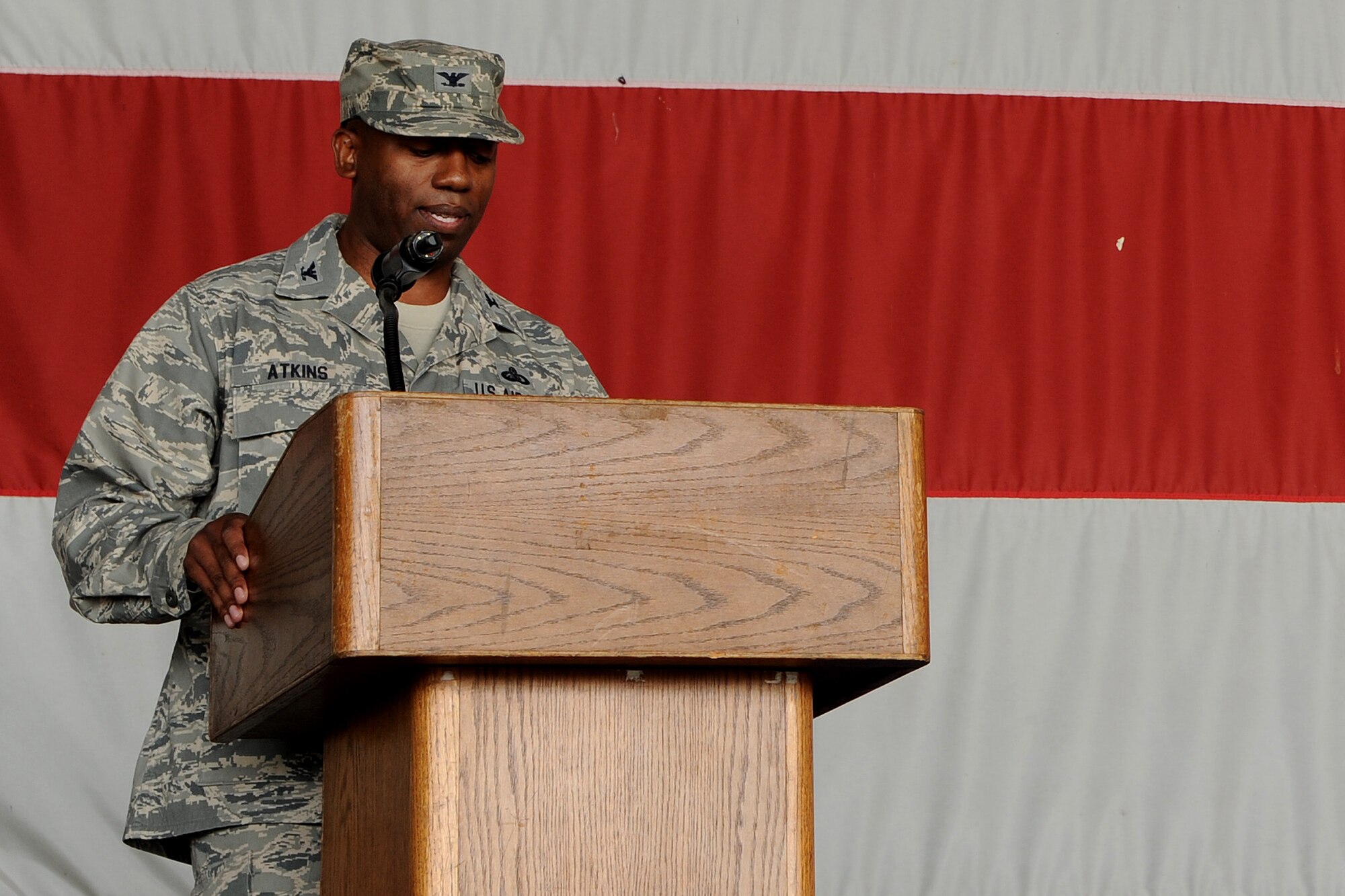 Col. Joseph Atkins, 8th Mission Support Group commander, addresses his group for the first time during the change of command ceremony at Kunsan Air Base, Republic of Korea, June 22, 2012. Atkins assumed command from Col. Suzanne Kumashiro, making him the wing's newest "Falcon."  (U.S. Air Force photo/Staff Sgt. Rasheen A. Douglas)