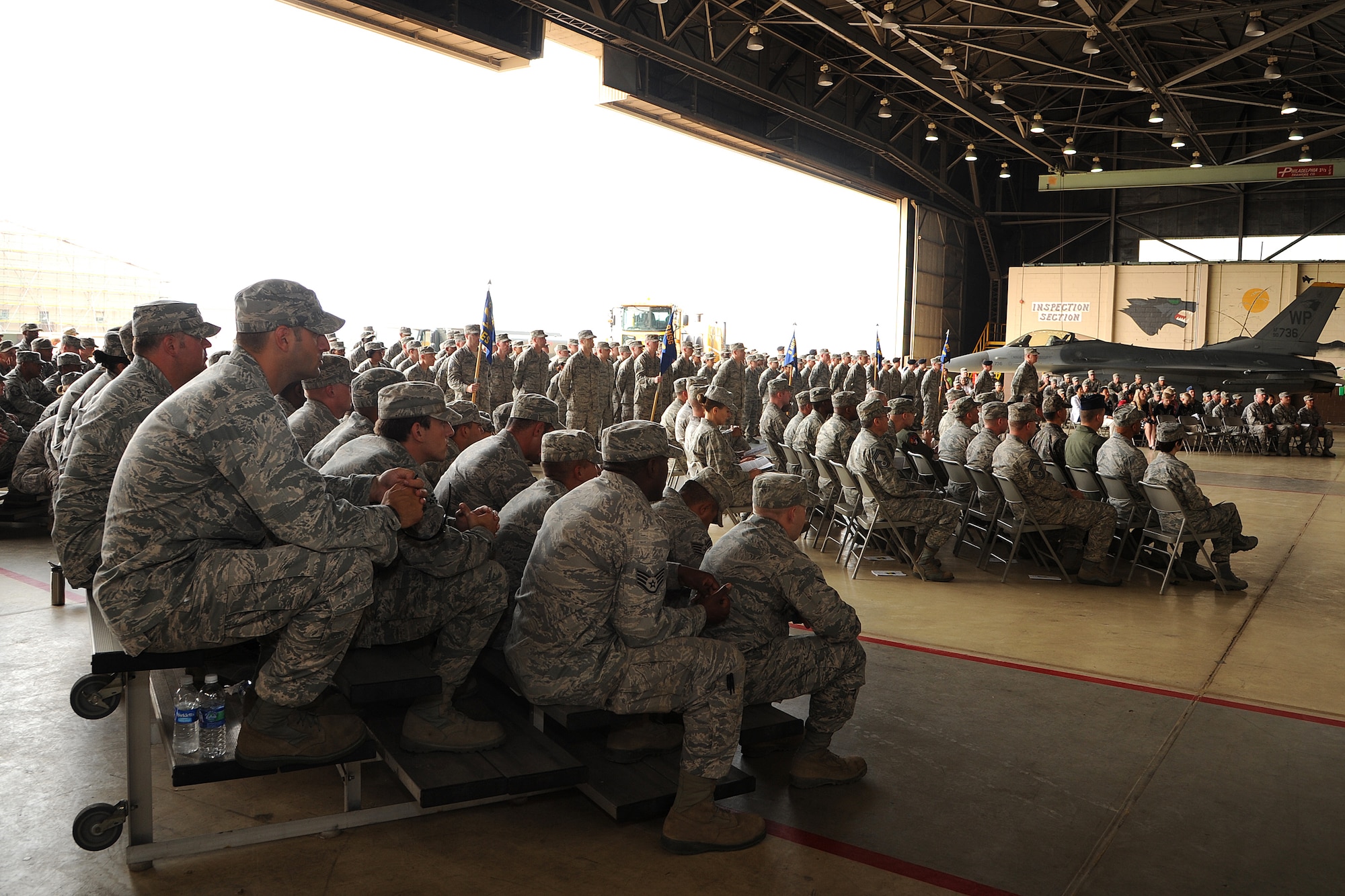 Members and visitors of the 8th Fighter Wing sat in attendance to watch the 8th Mission Support Group change of command ceremony on Kunsan Air Base, Republic of Korea, June 22, 2012. The ceremony marks the official acceptance of Col. Joseph Atkins as the 8th MSG's newest commander. (U.S. Air Force photo/Staff Sgt. Rasheen A. Douglas) 
