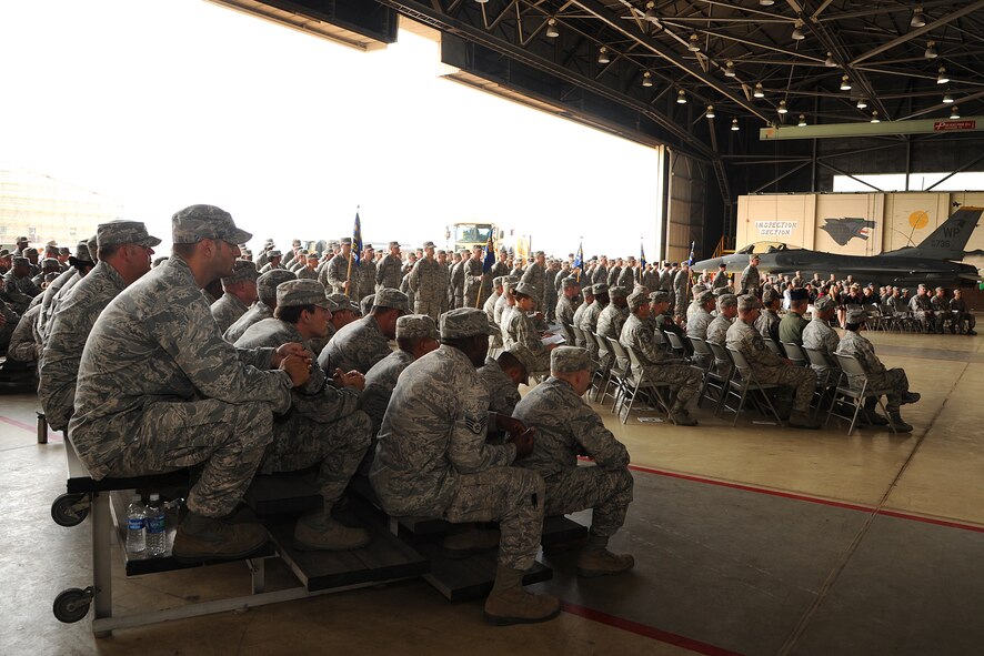Members and visitors of the 8th Fighter Wing sat in attendance to watch the 8th Mission Support Group change of command ceremony on Kunsan Air Base, Republic of Korea, June 22, 2012. The ceremony marks the official acceptance of Col. Joseph Atkins as the 8th MSG's newest commander. (U.S. Air Force photo/Staff Sgt. Rasheen A. Douglas) 