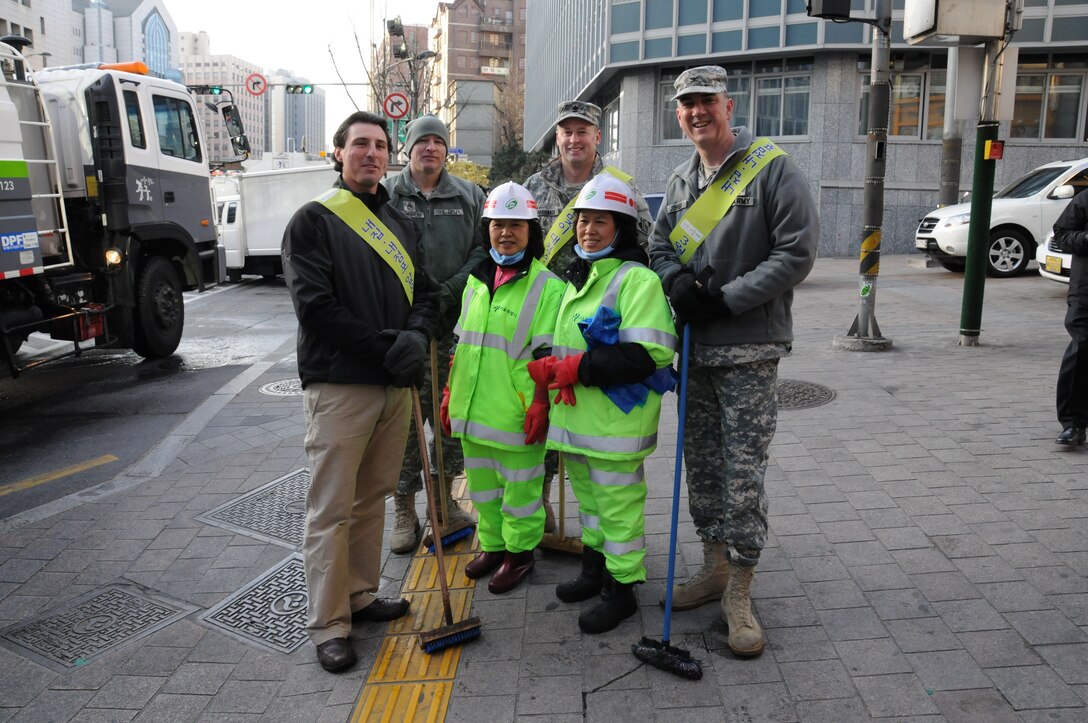 U.S. Army Corps of Engineers Far East District employees pose for a photograph during an off-base cleanup in Seoul, Korea.