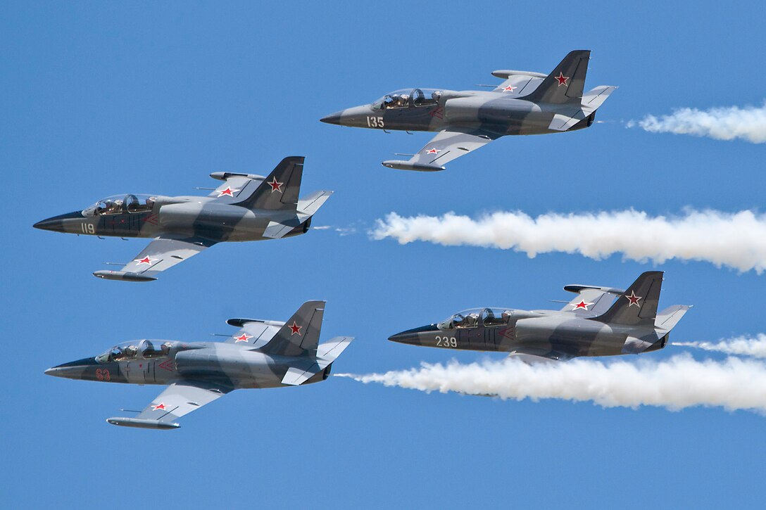 Four-ship formation pass of the Hoppers Jet Demonstration Team at the Volk Field Open House, June 2, 2012.  Photo by Joe Oliva, Jetpix.com