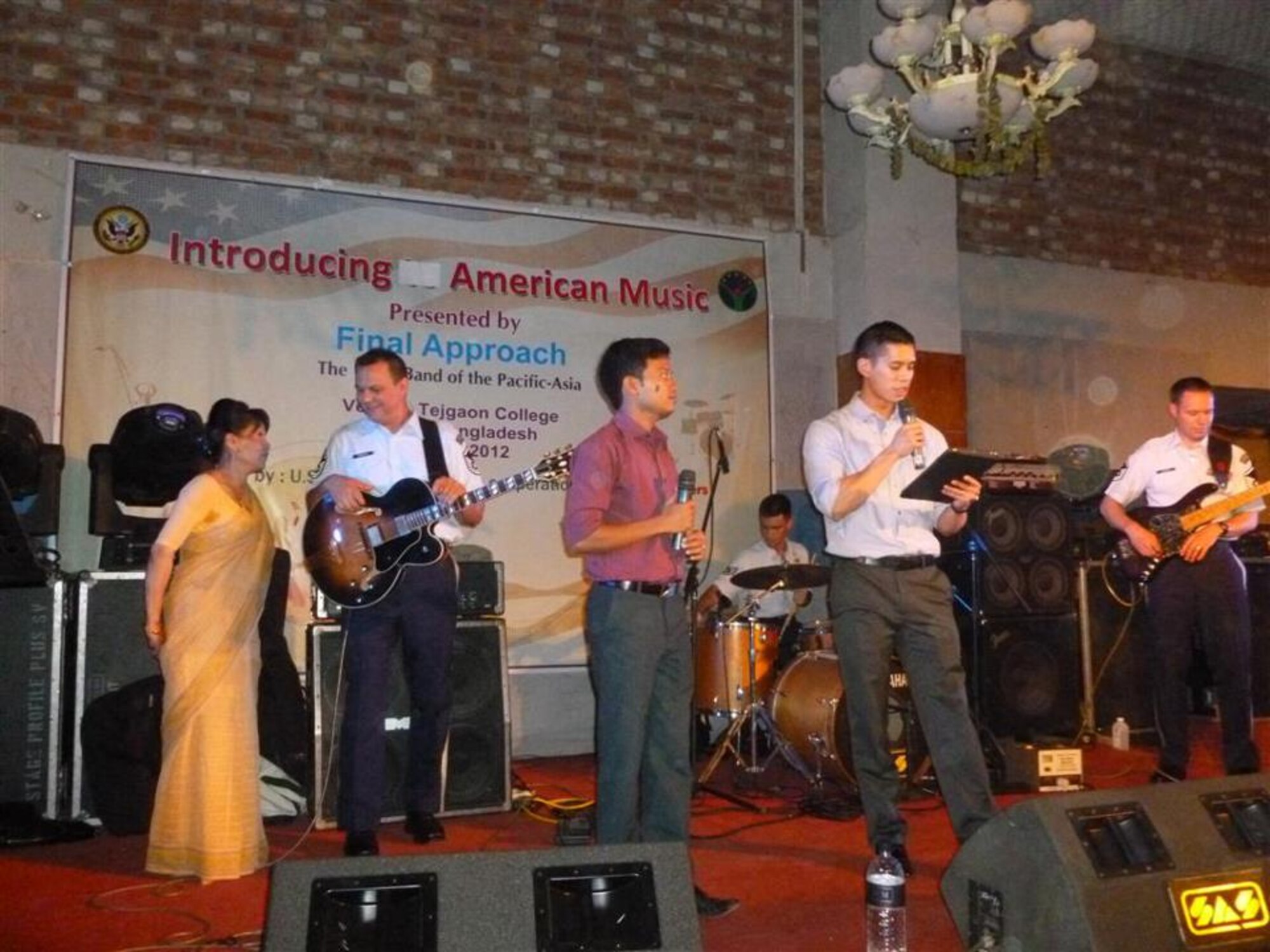 Final Approach, an ensemble from the USAF Band of the Pacific-Asia is introduced as they perform for more than 500 Tejgaon College students in Bangladesh.