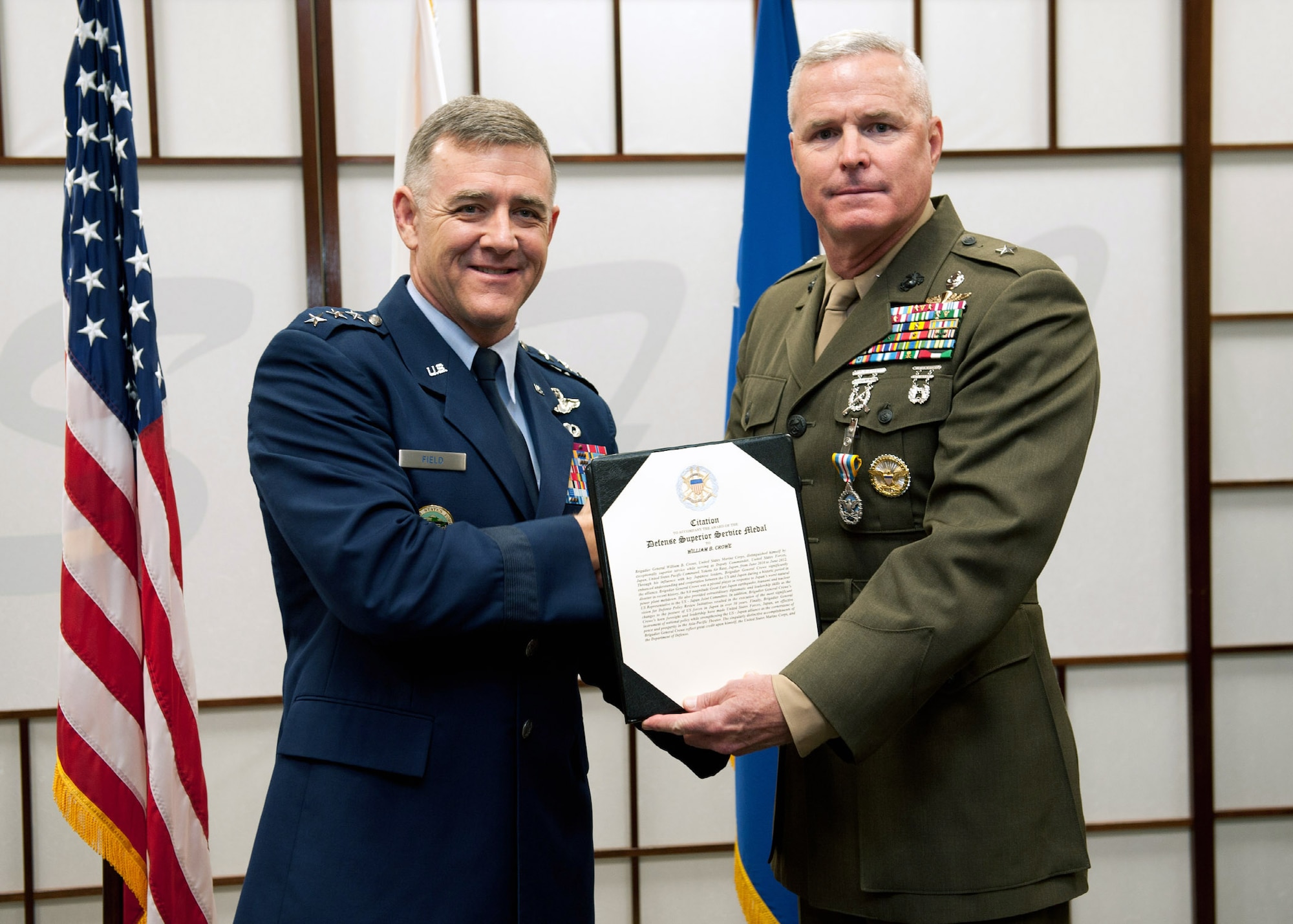 YOKOTA AIR BASE, Japan -- Lt. Gen. Burton M. Field, U.S. Forces, Japan, and 5th Air Force commander, left, presents Brig. Gen. William "Blake" Crowe, U.S. Forces, Japan deputy commander, right, with the Defense Superior Service Medal in a ceremony at the USFJ headquarters building on June 26, 2012. Crowe's citation explains his "keen foresight and leadership have made USFJ an effective instrument of national policy while strengthening the U.S. - Japan alliance as the cornerstone of peace and prosperity in the Asia-Pacific Theater." Crowe has been assigned to USFJ since June 2010. (U.S. Air Force photo/ Airman 1st Class Desiree Economides)
