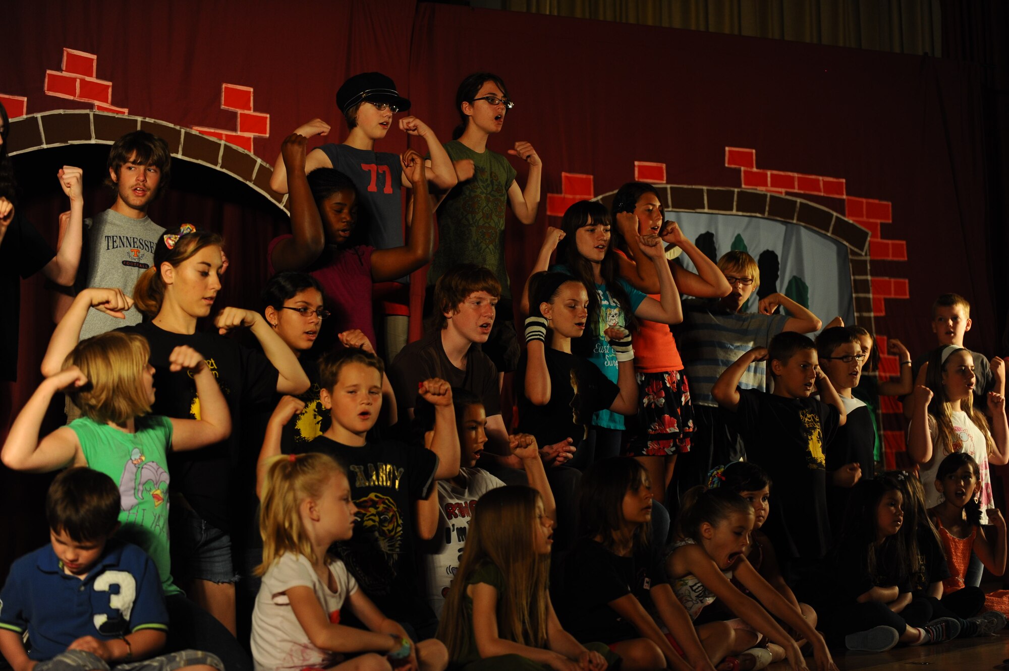 Children from the Ellsworth Air Force Base community rehearse a musical number for their performance of “The Secret Garden” with the Missoula Children’s Theater in the base theater at Ellsworth AFB, S.D., June 15, 2012. MCT reached out to the Ellsworth community and introduced children to the world of theater. (U.S. Air Force photo by Airman 1st Class Zachary Hada, Released)