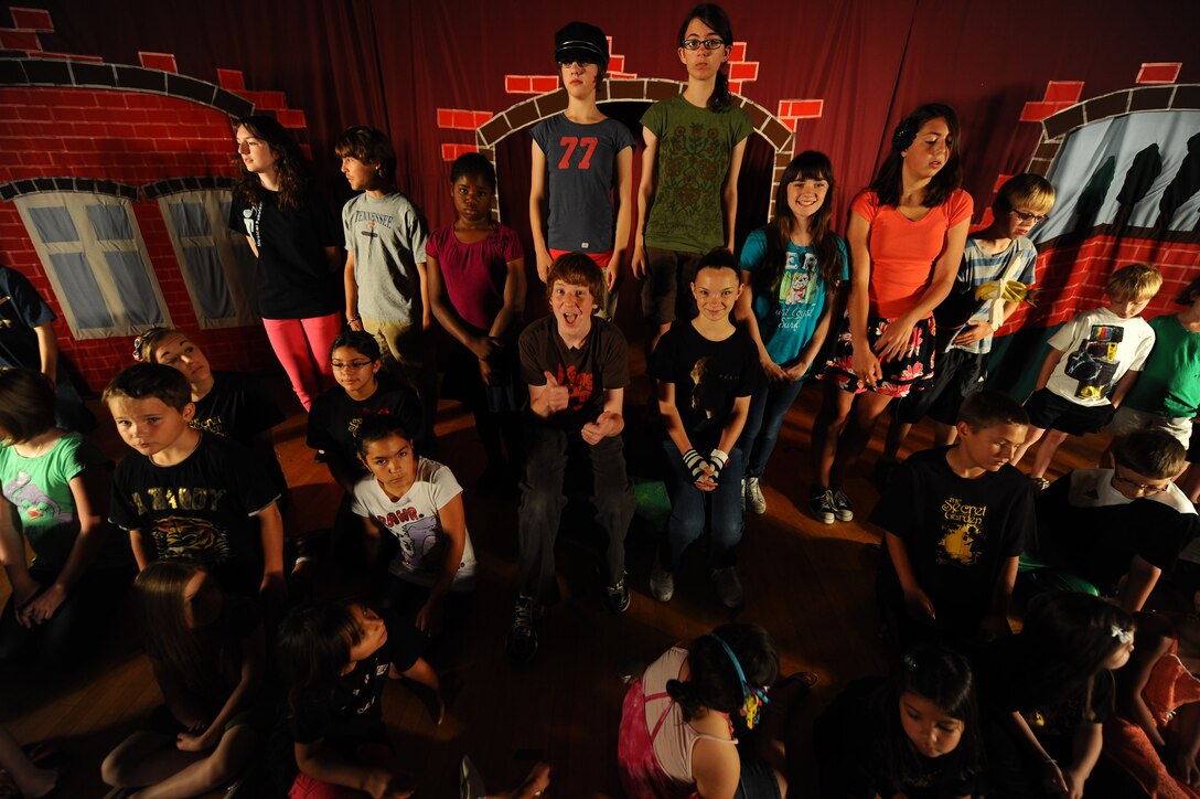 Children from the Ellsworth Air Force Base community rehearse for their performance of “The Secret Garden” with the Missoula Children’s Theater at the theater on Ellsworth AFB, S.D., June 15, 2012. MCT is a community theater program based in Missoula, Mont. that is dedicated to branch out to as many communities as possible to introduce theater to children to ignite a flame of interest, passion and self exploration. (U.S. Air Force photo by Airman 1st Class Zachary Hada, Released)