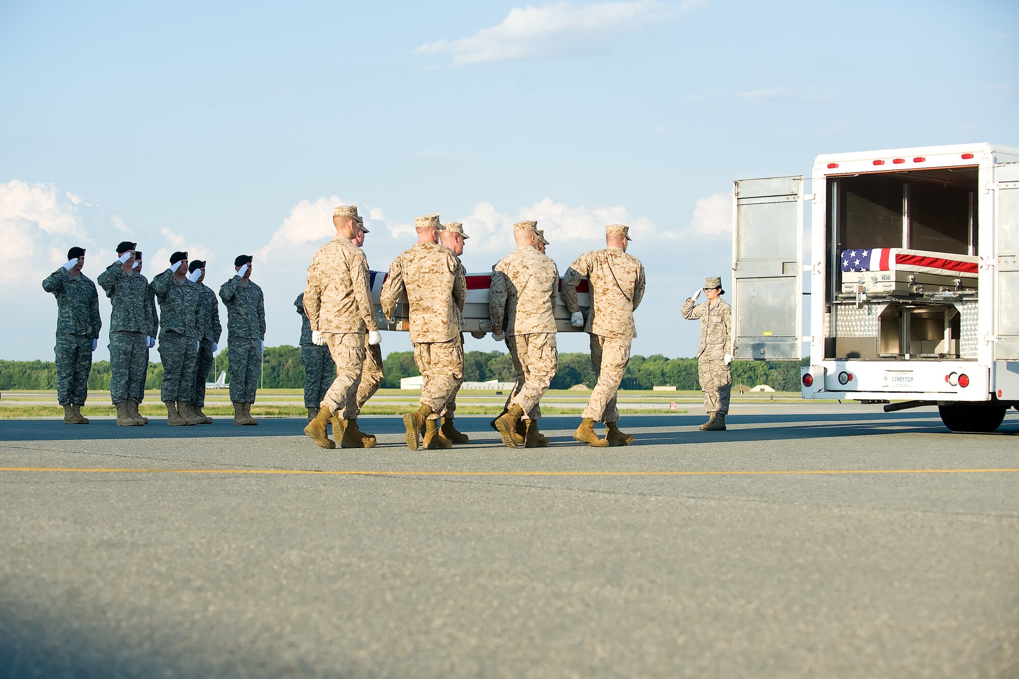A U.S. Marine Corps carry team transfers the remains of Marine Pfc. Steven P. Stevens II of Tallahassee, Fla., at Dover Air Force Base, Del., June 25, 2012. Stevens was assigned to 1st Combat Engineer Battalion, 1st Marine Division, I Marine Expeditionary Force, Camp Pendleton, Calif. (U.S. Air Force photo/Adrian R. Rowan)