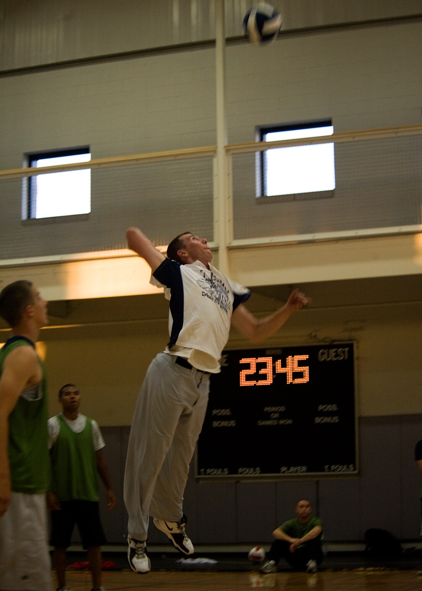 A player from the 7th Equipment Maintenance Squadron volleyball team prepares to spike the volleyball June 19, 2012, during a squadron game at Dyess Air Force Base, Texas. Squadrons throughout Dyess formed teams to participate in the 2012 base volleyball tournament. Regular season games will be played up to July. Afterward, the base volleyball tournament will begin. The tournament will not only determine which squadron is the best, but also give Dyess airmen an opportunity to build moral and promote physical fitness. (U.S. Air Force photo by Airman 1st Class Damon Kasberg/Released) 