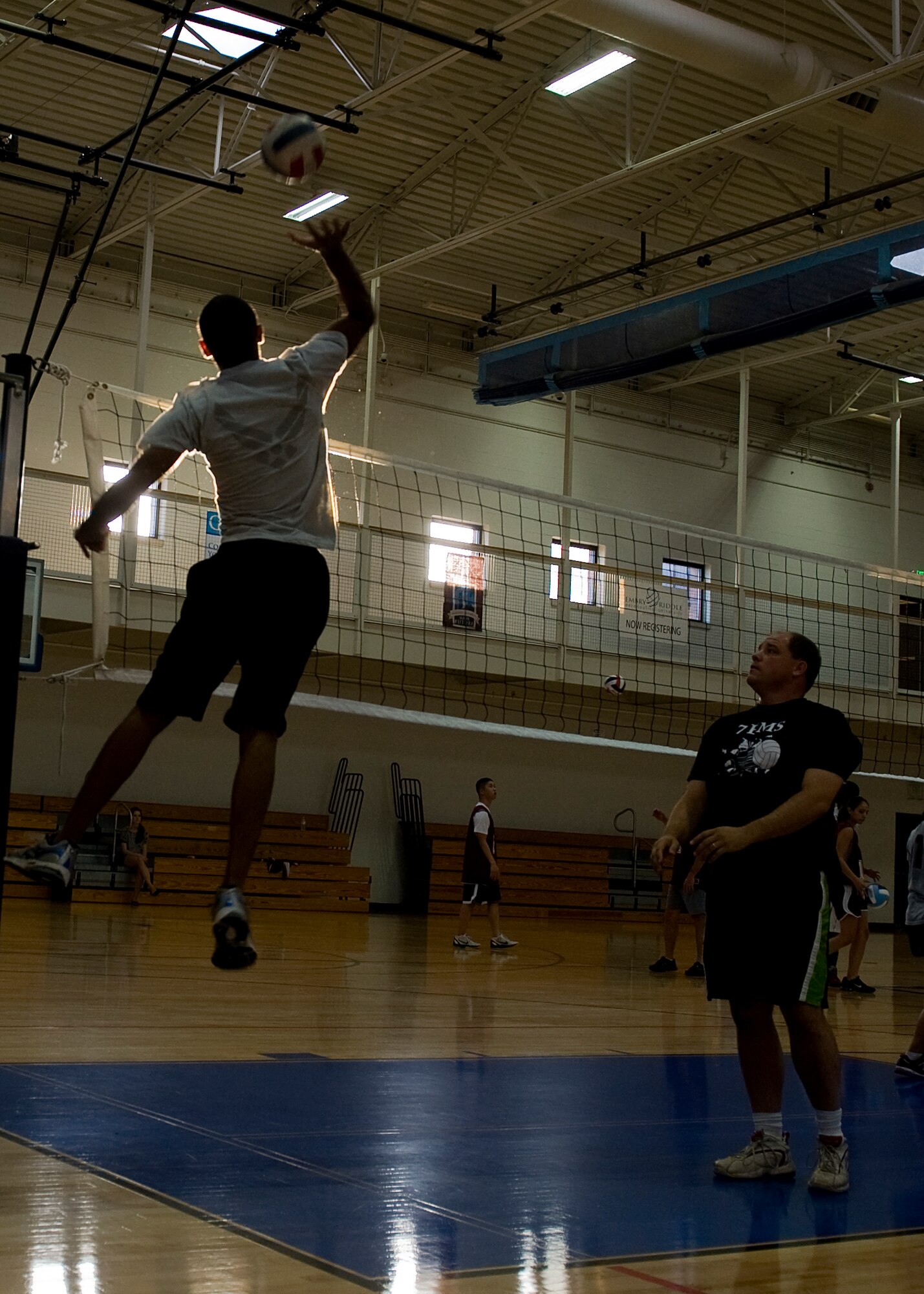 A Dyess airman spikes a volleyball June 19, 2012, prior to a squadron game at Dyess Air Force Base, Texas. Squadrons throughout Dyess formed teams to participate in the 2012 base volleyball tournament. Regular season games will be played up to July. Afterward, the base volleyball tournament will begin. The tournament will not only determine which squadron is the best, but also give Dyess airmen an opportunity to build moral and promote physical fitness. (U.S. Air Force photo by Airman 1st Class Damon Kasberg/Released) 