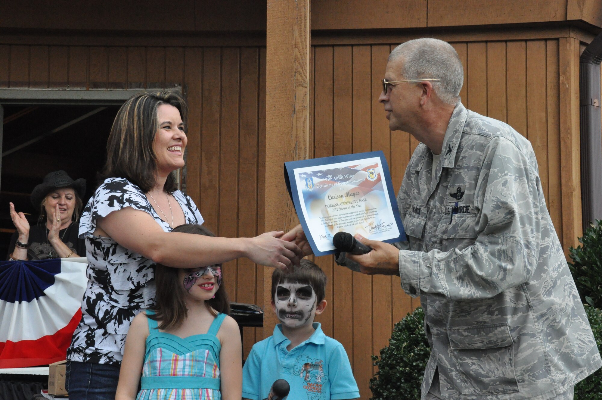 Carissa Mayes, the wife of Capt. Robert Mayes, 94th SFS operations officer, was chosen by a panel of judges for her outstanding commitment to the Dobbins Air Reserve Base community. She was named the 2012 Spouse of the Year at this year’s Wing Family Day June 5 here. (U.S. Air Force photo/Senior Airman Christina Bozeman/Released)