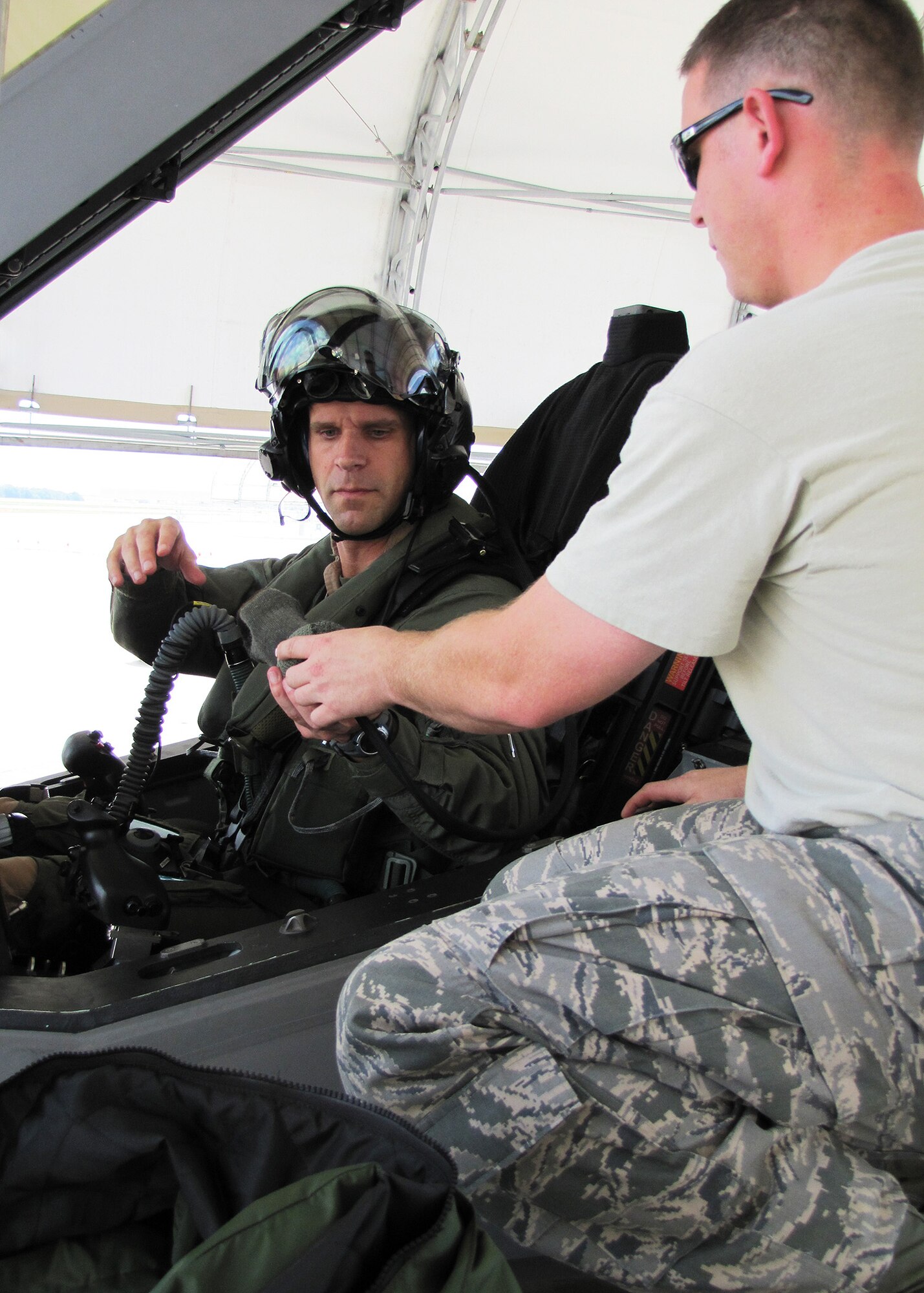 Marine Lt. Col. Roger Hardy, Defense Contract Management Agency F-35 Lightning II acceptance pilot, prepares for his first of six F-35A check out flights at the 33rd Fighter Wing. The AV-8B Harrier pilot is the first military member to qualify in flying operations at the wing who isn't assigned to Eglin. He currently works at the DCMA office, Lockheed Martin, Ft. Worth, Texas, to provide government oversight/inspection of contractor aircraft operations; ensuring safe and effective joint strike fighters are operationally ready before they are delivered to the Department of Defense. (U.S. Air Force photo/Maj. Karen Roganov)
