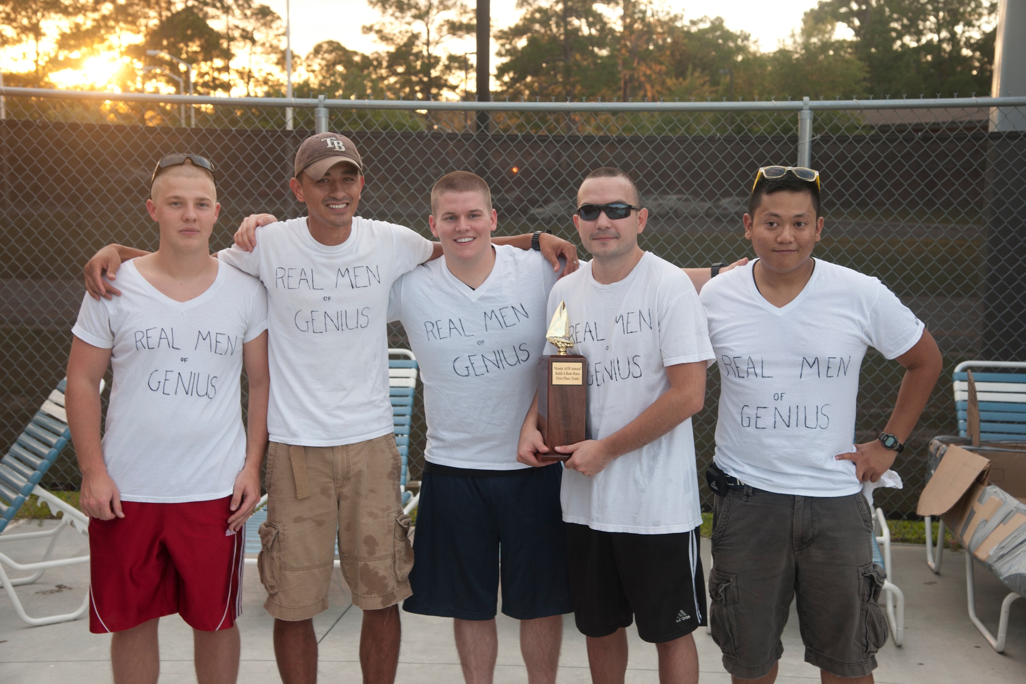 Members of the 23d Operation Support Squadron pose for a photo after winning the First Annual Build a Boat competition at Moody Air Force Base Ga., June 21, 2012. The 23d OSS won the competition by one second over the 23d Aircraft Maintenance Squadron. (U.S. Air Force photo by Airman 1st Class Paul Francis/Released)