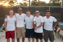 Members of the 23d Operation Support Squadron pose for a photo after winning the First Annual Build a Boat competition at Moody Air Force Base Ga., June 21, 2012. The 23d OSS won the competition by one second over the 23d Aircraft Maintenance Squadron. (U.S. Air Force photo by Airman 1st Class Paul Francis/Released)