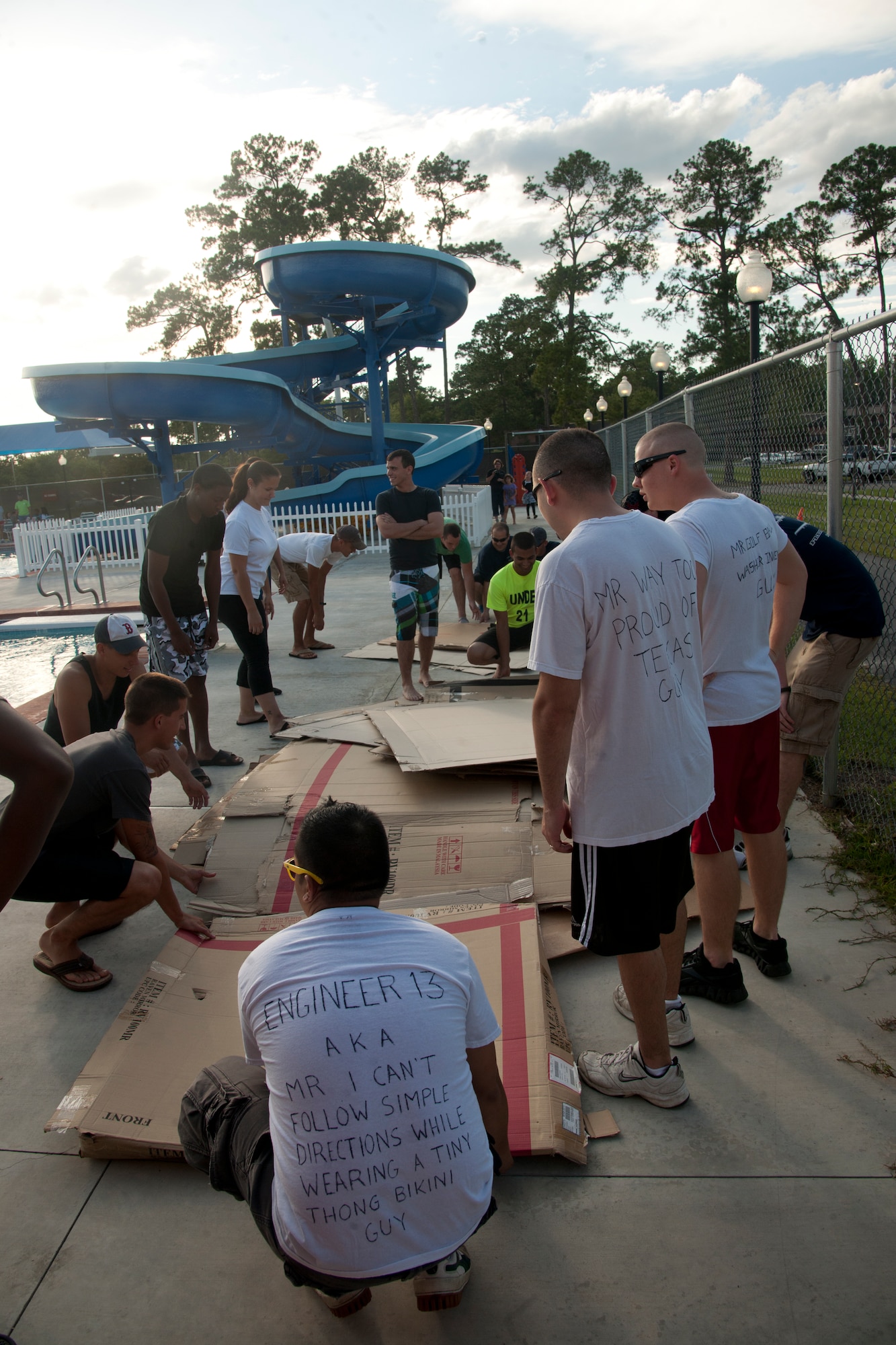 U.S. Air Force Airmen compete in the First Annual Build a Boat competition at Moody Air Force Base Ga., June 21, 2012. Teams of five had five minutes to collect materials, game plan, and think about their approach before the competition began. (U.S. Air Force photo by Airman 1st Class Paul Francis/Released)