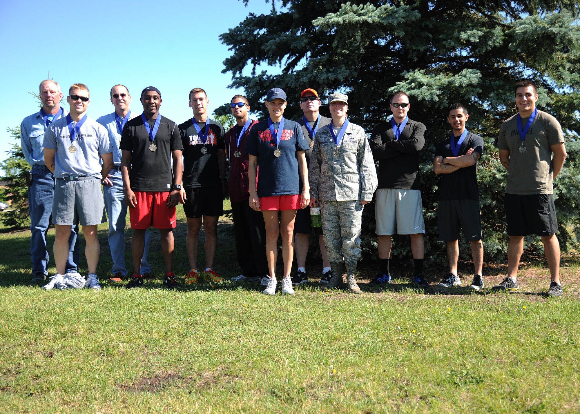 Participants of the half marathon pose for a photo June 21, 2012, on Grand Forks Air Force Base, N.D. (U.S. Air Force photo/Airman 1st Class Ashley N. Taylor)