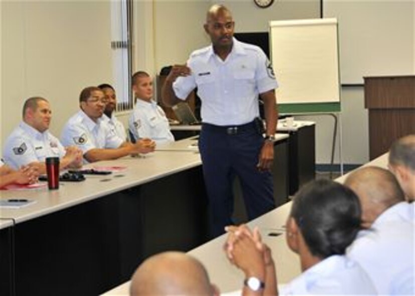 Chief Master Sgt. Cameron Kirksey, Command Chief for the 482nd Fighter Wing, addresses a recent Noncommissioned Officer Leadership Development Course at Homestead Air Reserve Base. (U.S. Air Force photo/Ian Carrier)