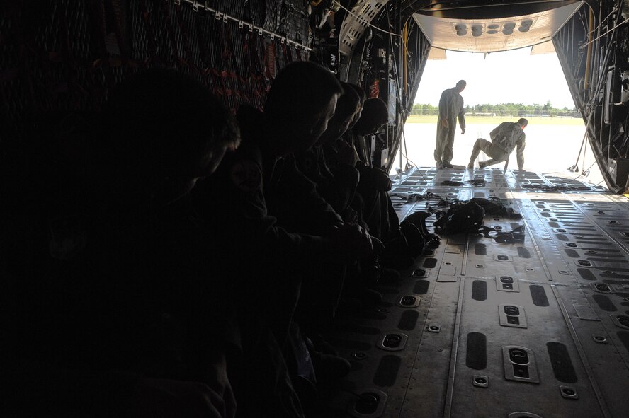 U.S. Air Force Academy cadets watch as security procedures are explained while in an HC-130P Combat King at Moody Air Force Base, Ga., June 19, 2012. Groups of cadets are visiting Moody throughout the summer to get a taste of Air Force careers and the military lifestyle. (U.S. Air Force photo by Staff Sgt. Ciara Wymbs/Released) 
