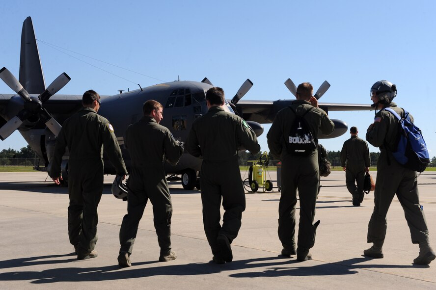 Cadets from the U.S. Air Force Academy walk toward an HC-130P Combat King at Moody Air Force Base, Ga., June 19, 2012.  The cadets also got the chance to tour different squadrons, visit downtown Valdosta and learn more about the Moody mission. (U.S. Air Force photo by Staff Sgt. Ciara Wymbs/Released)