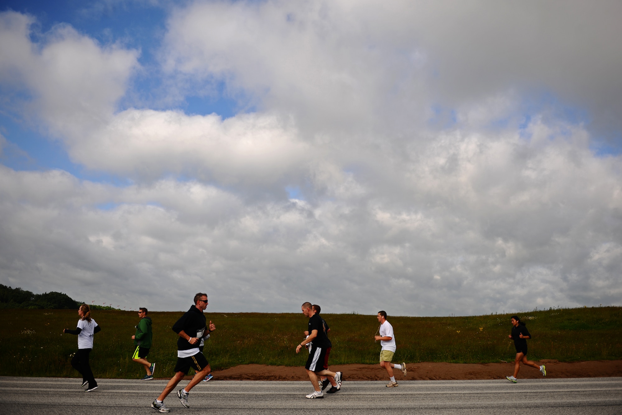 SPANGDAHLEM AIR BASE, Germany – Spangdahlem community members run during the “Jog 4 Joe” 5K fun run here June 22. The 52nd Civil Engineer Squadron Explosive Ordnance Disposal Flight organized the race to honor Staff Sgt. Joseph J. Hamski, an EOD technician who was killed in action May 26, 2011. Money raised from the run was donated to the EOD Memorial Foundation and the Fisher House Foundation. The Pitsenbarger Airman Leadership School dedicated an auditorium to Hamski after the run. Hamski’s Community College of the Air Force diploma was later accepted by his mother, Mary-Ellen Winston, during the Spring 2012 Commencement ceremony.  (U.S. Air Force photo by Airman 1st Class Matthew B. Fredericks/Released)