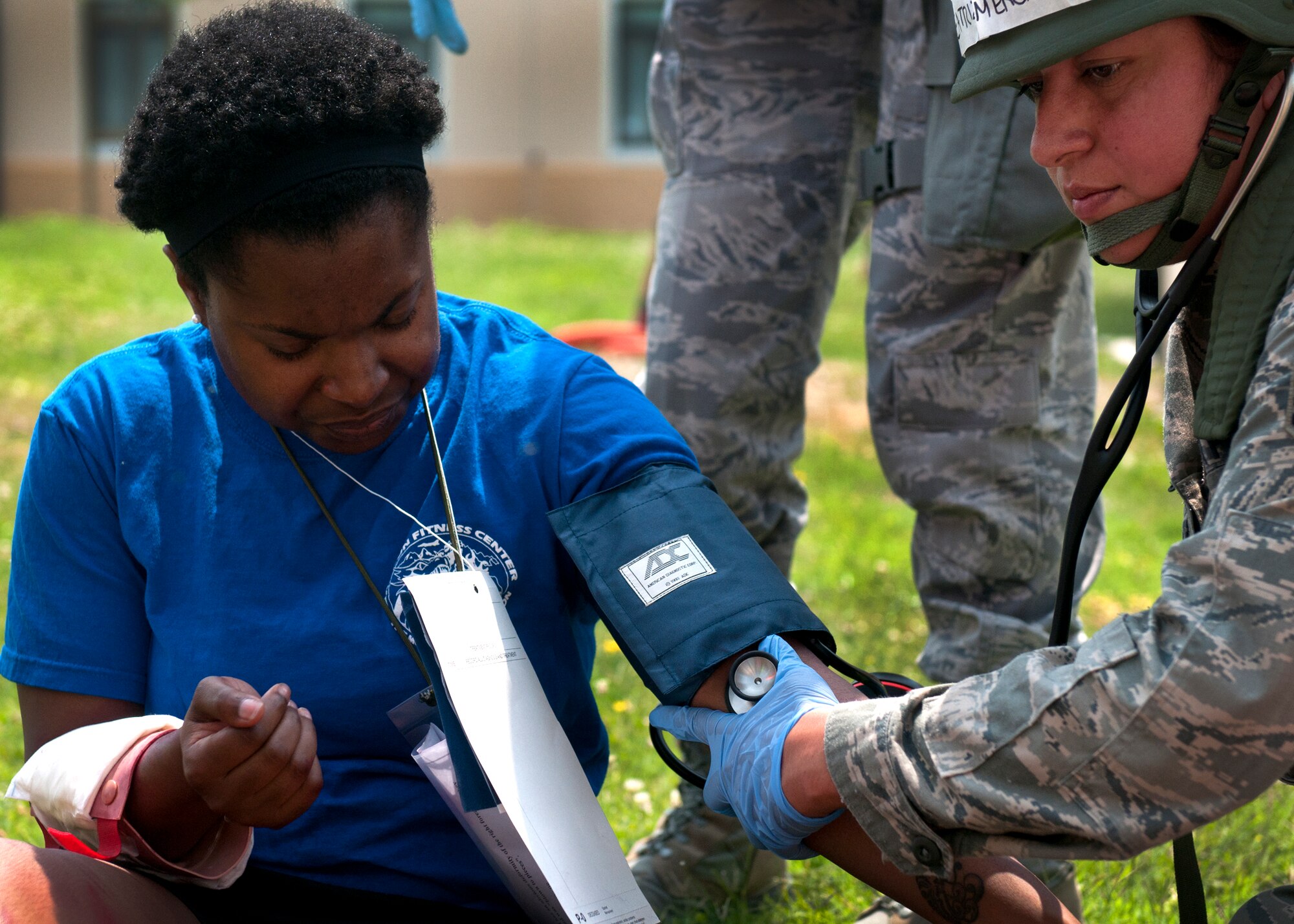 A medic treats a simulated casualty of an explosion during a major accident response exercise at Aviano Air Base June 20. Members of the 31st Medical Group were key players during the MARE and were graded on how well they were able to respond to the attack and treat patients. (U.S. Air Force photo Senior Airman Katherine Windish)