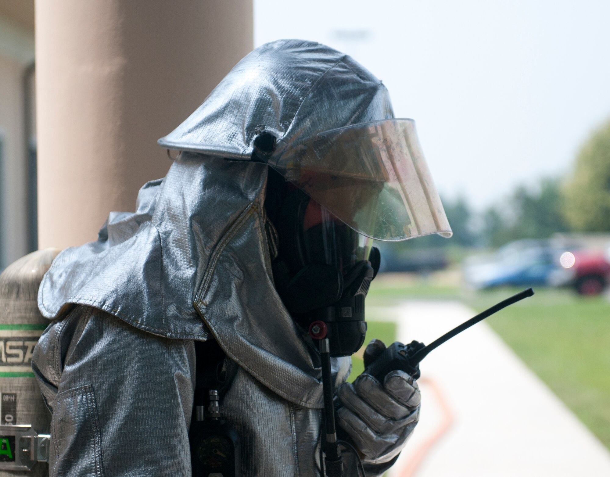 A 31st Civil Engineer Squadron firefighter communicates with fellow first responders during a major accident response exercise at Aviano Air Base June 20. The MARE was part of a larger local readiness exercise geared toward gauging the wing’s ability to respond to contingencies and crisis situations. (U.S. Air Force photo/Senior Airman Katherine Windish) 