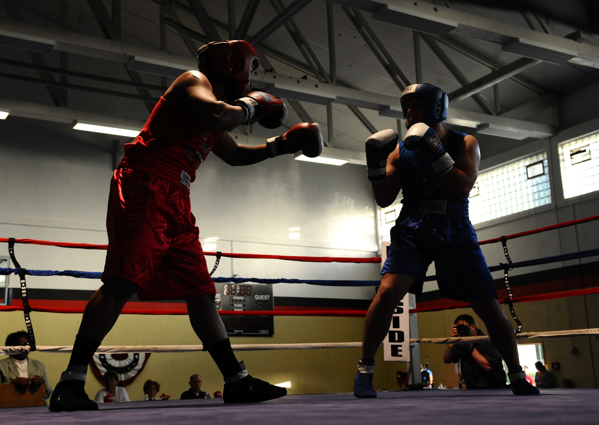 MIESAU, Germany – Senior Airmen Ronreco Smith, 52nd Communications Squadron, and Kevin Shields, 786th Civil Engineer Squadron, face off during a match at the U.S. Army Installation Management Command-Europe Boxing Invitational here June 23. Thirty service members competed at the invitational, which was open to all amateur boxers. (U.S. Air Force photo by Staff Sgt. Nathanael Callon/Released)
