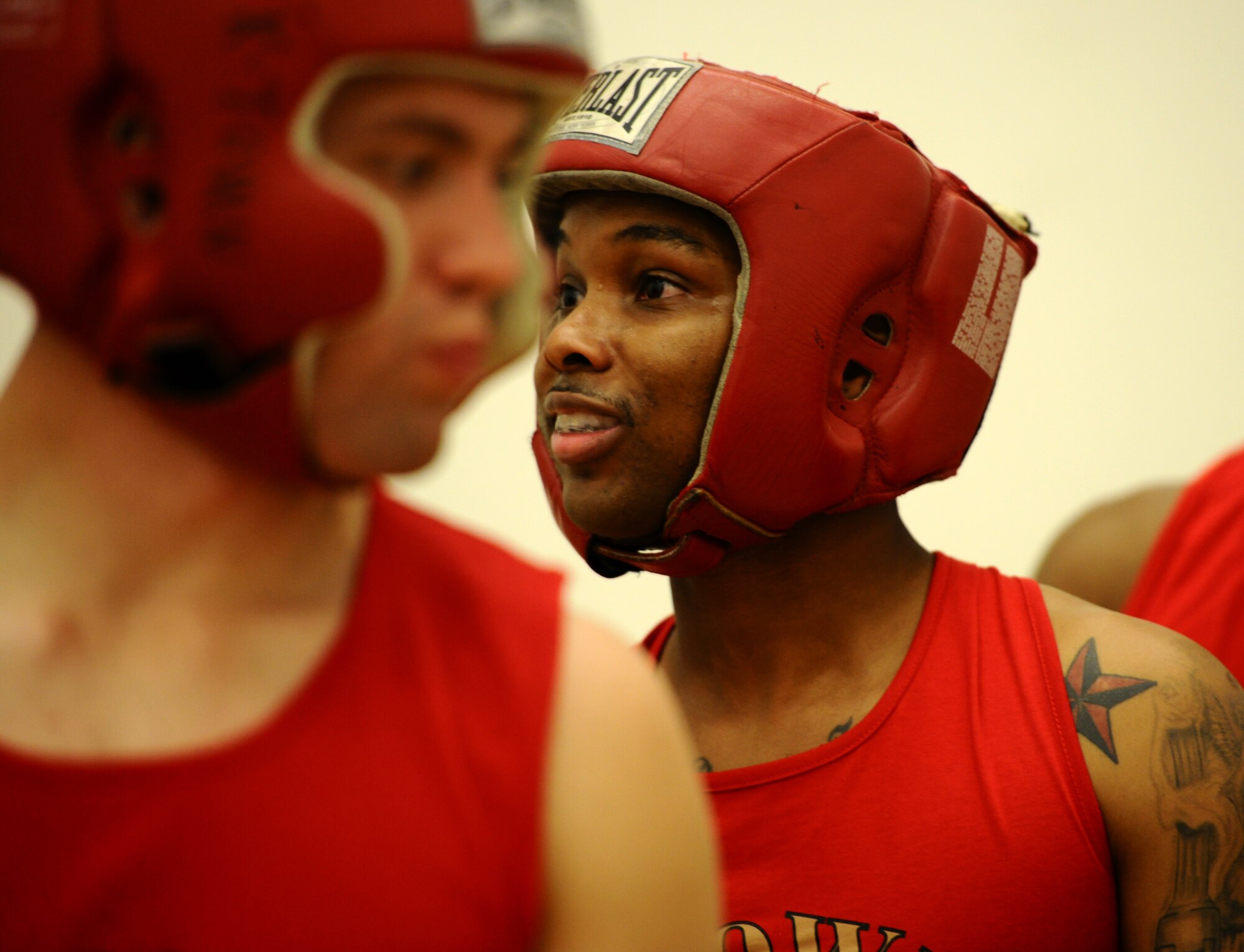 MIESAU, Germany – Senior Airman Ronreco Smith, 52nd Communications Squadron, stands in line before his bout against Senior Airman Kevin Shields, 786th Civil Engineer Squadron, Ramstein Air Base, at the U.S. Army Installation Management Command-Europe Boxing Invitational here June 23. Smith participated in his first boxing match at the event and earned his first victory over Shields. (U.S. Air Force photo by Staff Sgt. Nathanael Callon/Released)