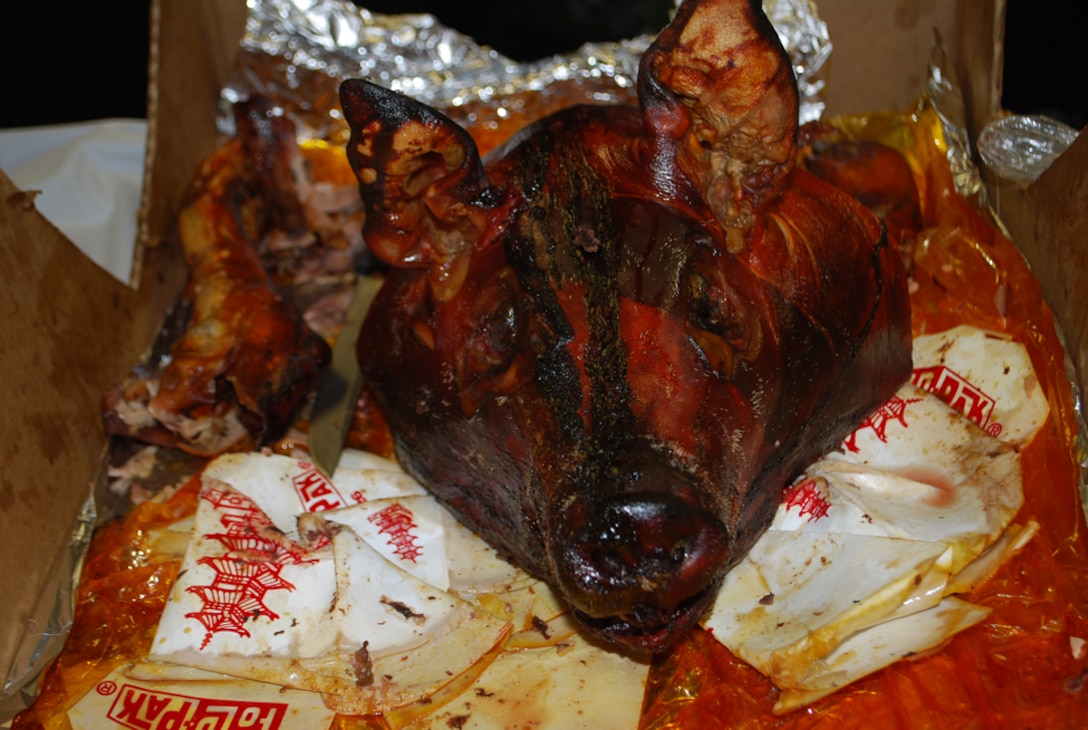 Everyone participating was treated to a food sampling of roasted pig.