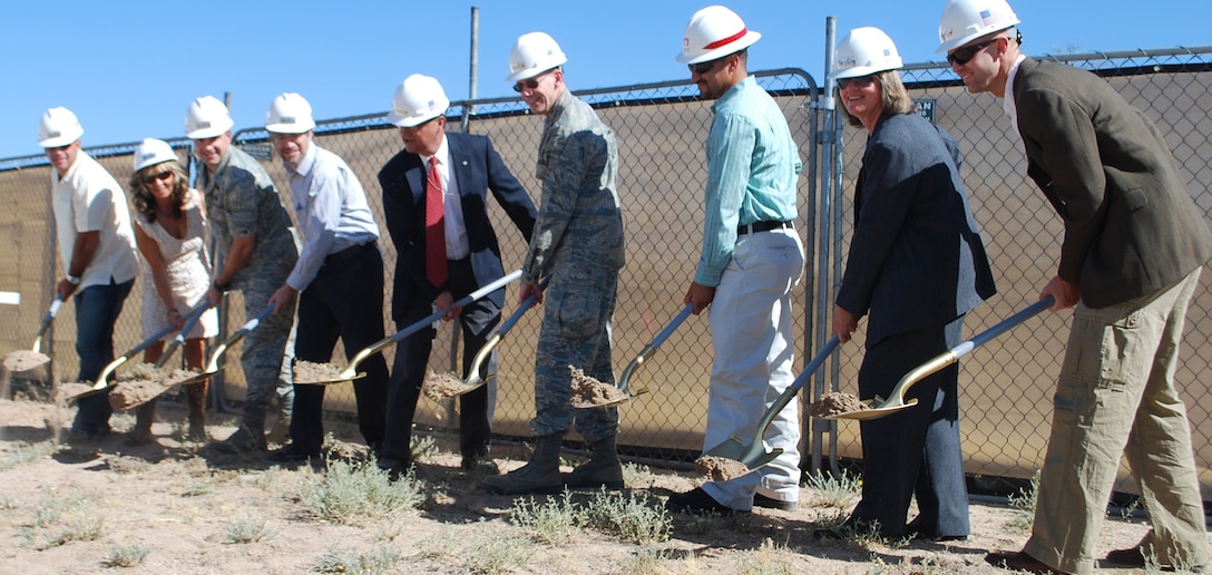 Participants break new ground for the Air Force Research Laboratory’s Space Vehicle Direc-torate’s Space Sensors Laboratory. Pictured left to right are: Mike Granjean, vice president, GranCor Enterprises, Inc.; Maria Cornay, president, GranCor Enterprises, Inc.; Col. Bill Coo-ley, materiel wing director, Space Vehicles Directorate; Dr. Mayer Landau, scientist, Space Vehicles Directorate; Michael Gallegos, chief, Infrastructure Management Branch, Space Vehicles Directorate; Col. Edward Masterson, division chief, Spacecraft Technology Division, Operations and Integration Division Space Vehicles Directorate; Filemon Gallegos, project manager, U.S. Army Corps of Engineers, Albuquerque District; Sue Atwood, deputy director, Space Vehicles Directorate; and Dr. Christian Morath, scientist, Space Vehicles Directorate.