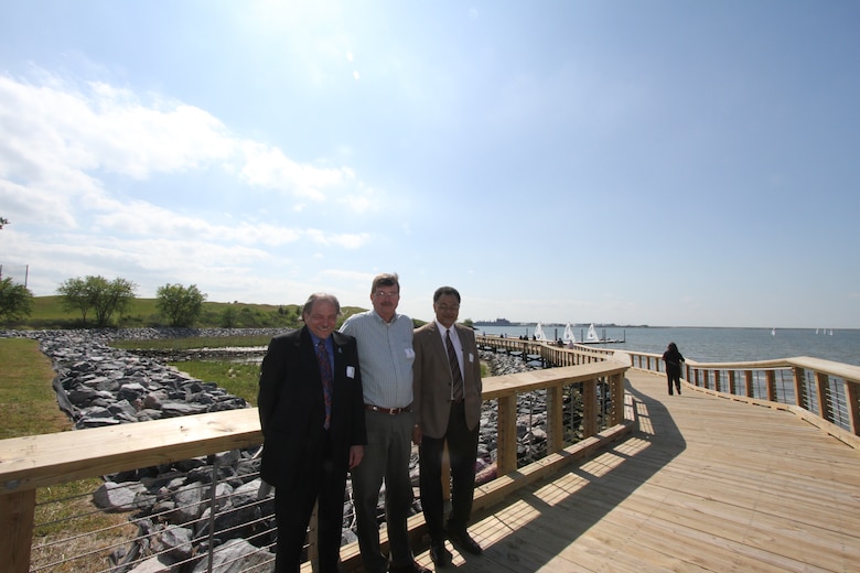 From left to right: Russ Pearson, ODU director of Real Estate and Space Management and Norfolk District's Tom Friberg, contracting officer representative and Robert Pretlow, project manager, reflect on the successful completion of the ODU Drainage and Canal Wetland Restoration Project during a ribbon-cutting ceremony held April 20 on the campus of Old Dominion University. (U.S. Army photo/Jerry Rogers)