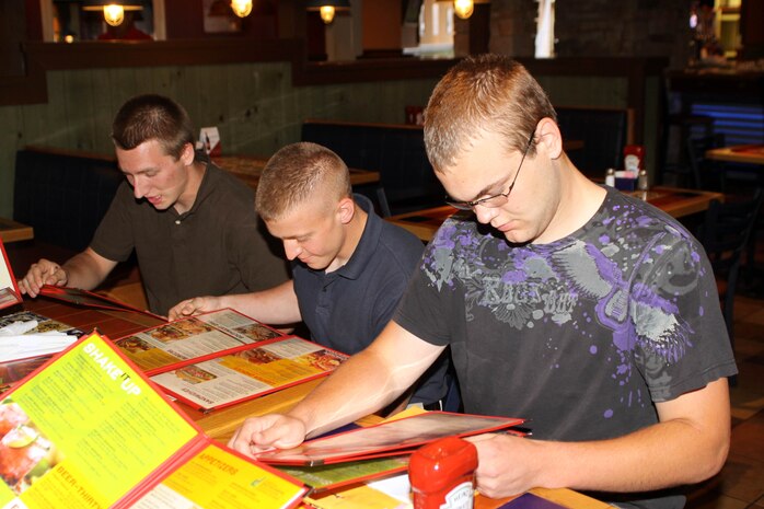 Soon to be Company E recruits, eat their last civilian meal at the San Diego International Airport June 11.
