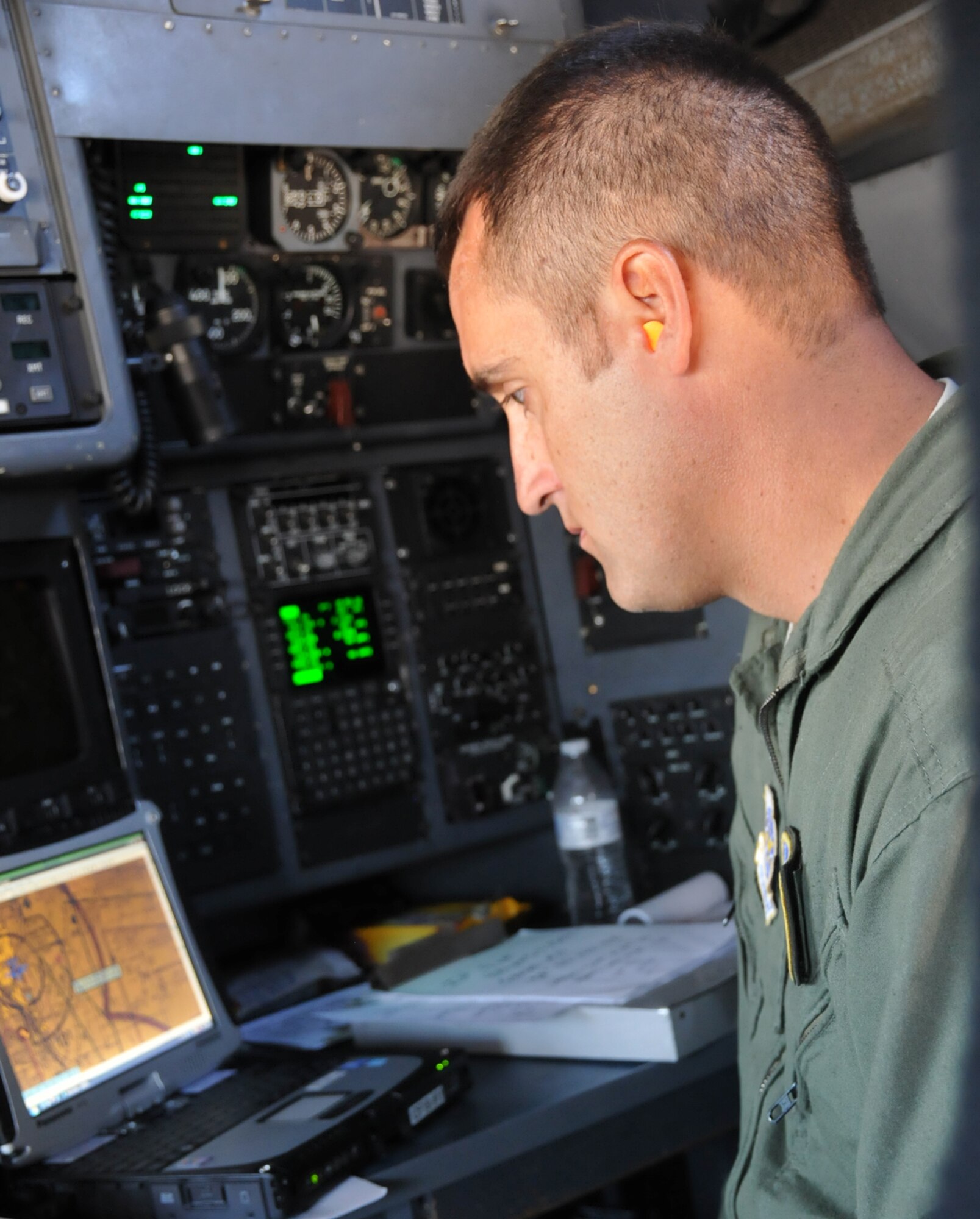 Capt. Michael Damron prepares for an upcoming Modular Airborne Fire Fighting System mission June 27, 2012. Damron is an active-duty Airman assigned to the Wyoming Air National Guard’s 153rd Airlift Wing. Damron is a C-130 Hercules navigator. (U.S. Air Force photo/Airman 1st Class Nichole Grady)