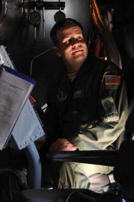 Master Sgt. Marshall Davis conducts flight preparations at Peterson Air Force Base, Colo., on June 27, 2012. Modular Airborne Fire Fighting System units from the Wyoming Air National Guard’s 153rd Airlift Wing were activated June 24, 2012, to assist in fire-suppression efforts in the Rocky Mountain region. Davis is a MAFFS-qualified loadmaster assigned to the 187th Airlift Squadron. (U.S. Air Force photo/Airman 1st Class Nichole Grady)