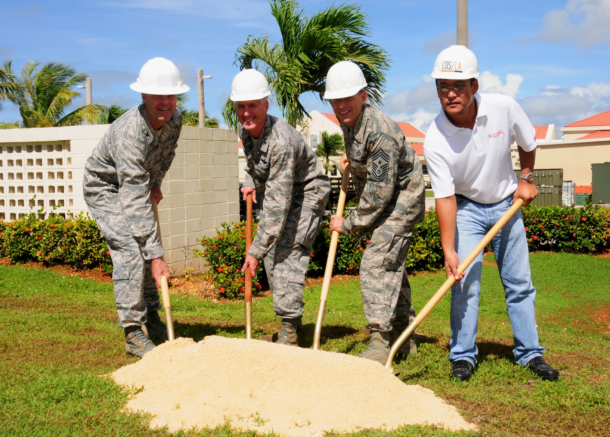 ANDERSEN AIR FORCE BASE, Guam-- Leadership from Team Andersen and current contractors break ground for a new warehouse behind the 36th Medical Group June 22. The new warehouse will soon be constructed to store the 36 MDG's medical war reserve materials in one location. This new warehouse will add an additional 4,000 square feet of climate-controlled space, thus allowing the 36 MDG to consolidate all of its WRM assets in one location.(A logo was removed from a helmet to refrain from
endorsement)(U.S. Air Force photo illustration by Senior Airman Benjamin
Wiseman/Released)
