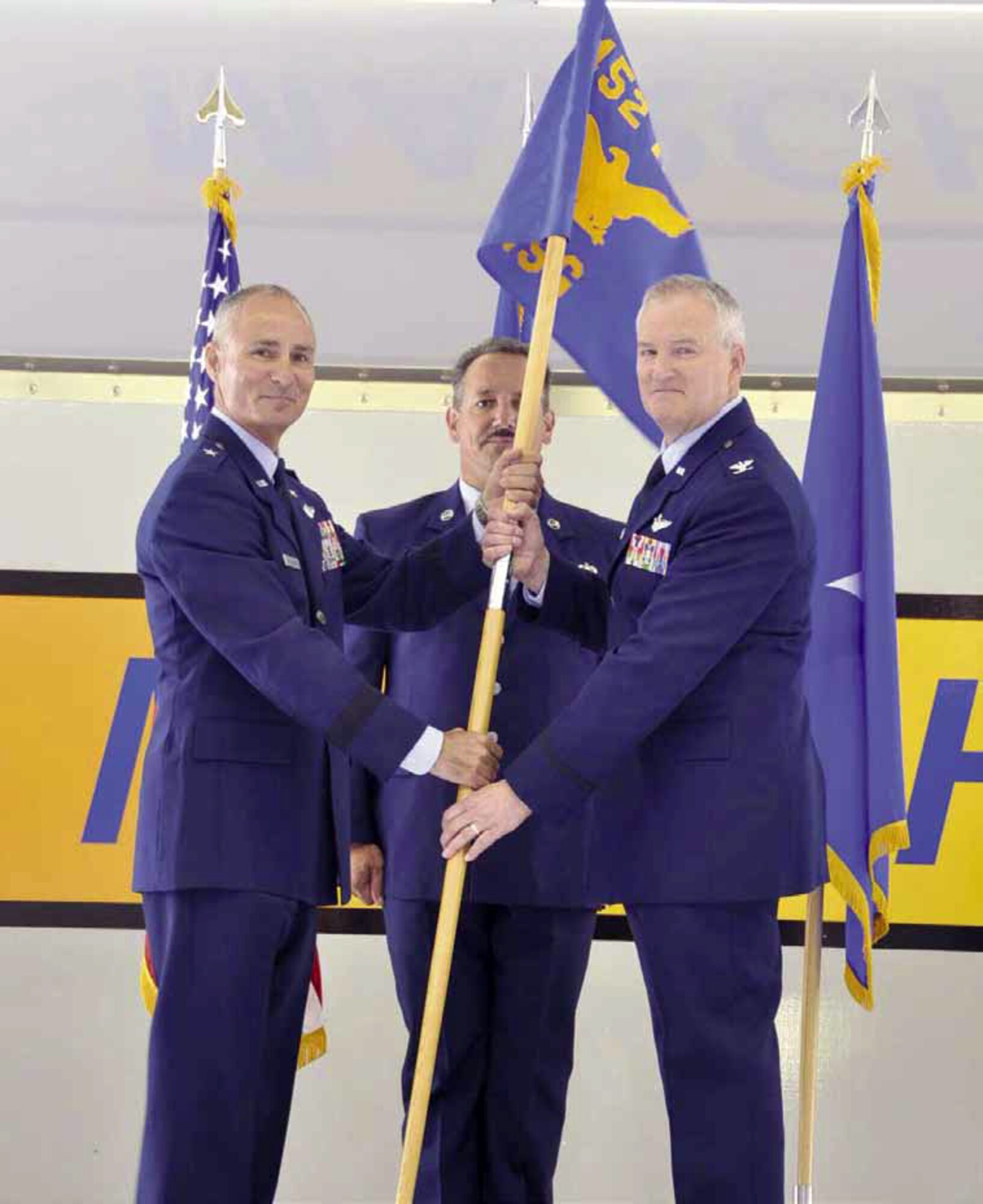 Col. Tim McCoy received the 452d Mission Support Group flag from Brig. Gen. Karl McGregor during his change of command ceremony at March Field, Sun., June 10, 2012. (U.S. Air Force photo by Master Sgt. Linda Welz)