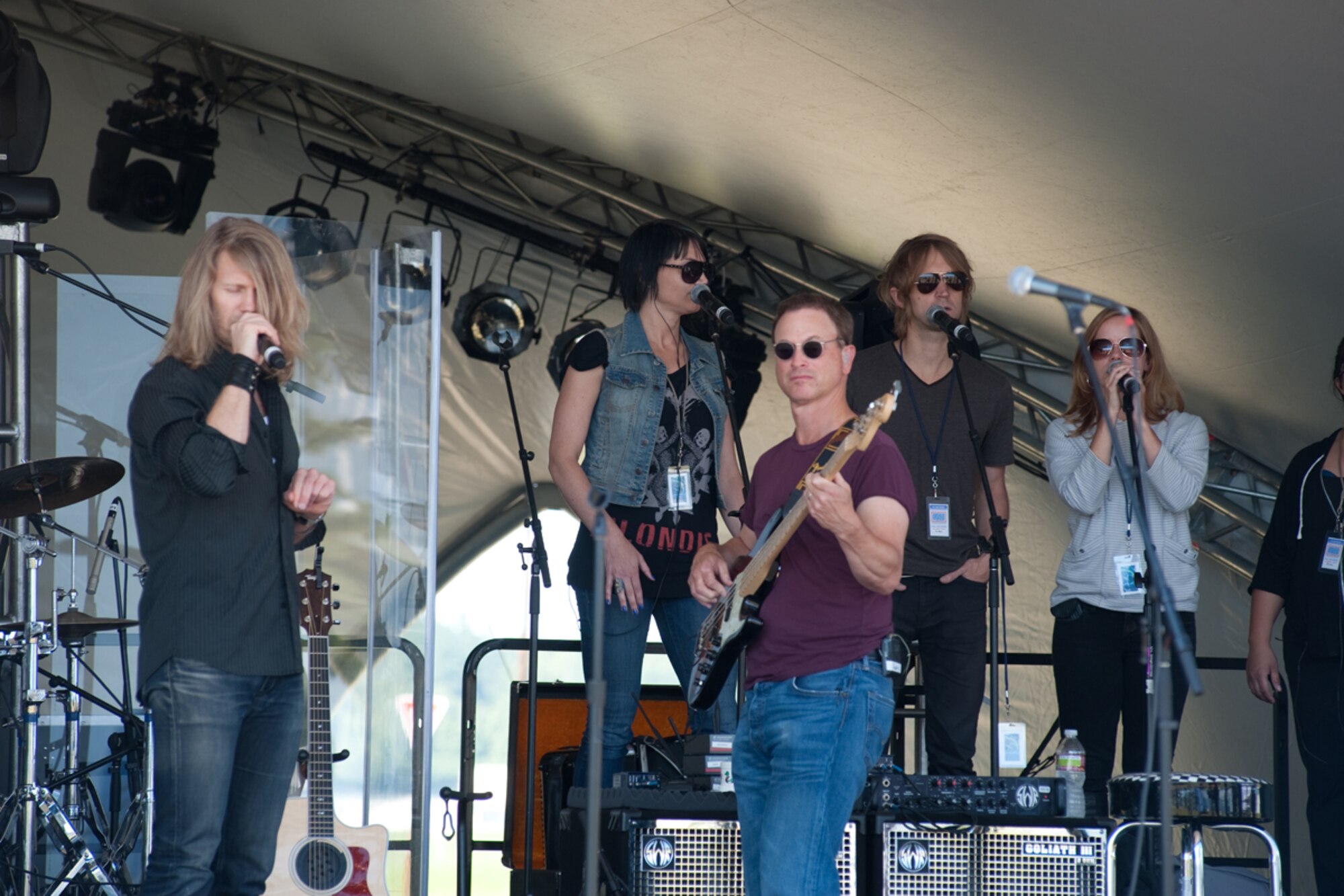 Gary Sinise, center, and the Lt. Dan band perform sound checks prior to their concert on Joint Base Elmendorf-Richardson June 22. The band perform regularly for troops in appreciation for their service, and the actor/musician also participates in other charitable events such as parades. Sinise is perhaps best known for his role as Lt. Dan in Forest Gump, and has made appearances in many other films and shows including the currently running CSI: NY. (U.S. Force photo/Staff Sgt. Robert Barnett)