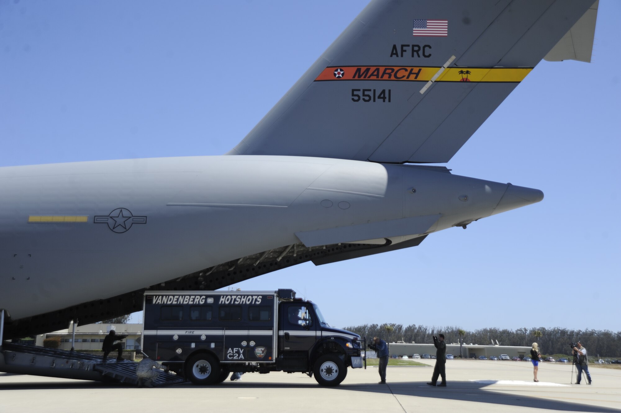 A Vandenberg Hot Shots vehicle backs into the belly of a C-17 Globemaster here from March Air Reserve Base June 27. Eighteen members of the Vandenberg Hot Shot crew, along with two hot shots crew carrier vehicles, one superintendant support vehicle and one all terrain vehicle deployed to Colorado to support the wildland fire fighting efforts. (U.S. Air Force photo/Staff Sgt. Andrew Satran)

